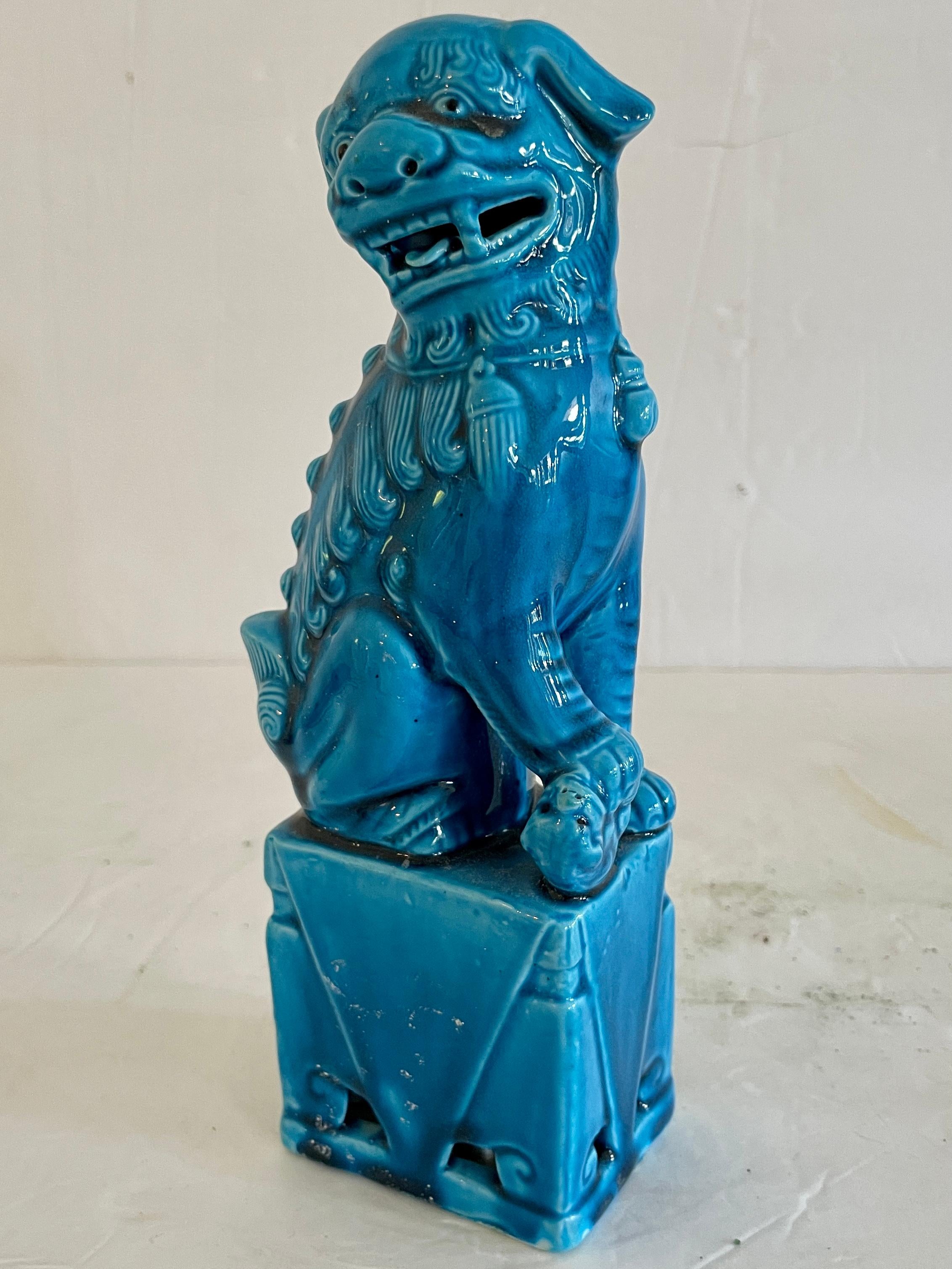 Fabulous single ceramic Asian turquoise female foo dog. The carving details are amazing. Great addition to your chinoiserie collection.