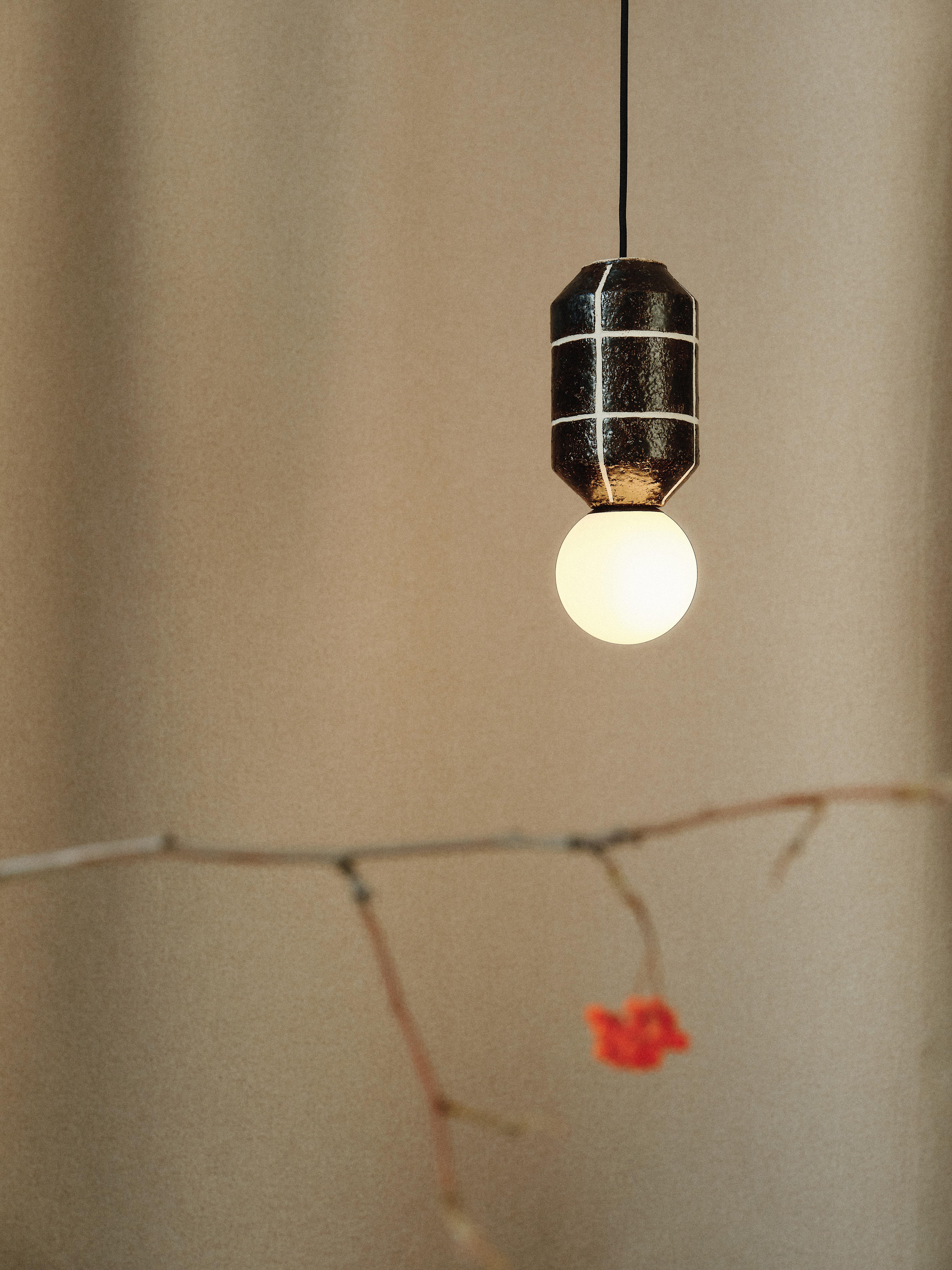 Product name: NAVAZI
Category: Lighting, Decoration
Type: Decoratio, Pendant
Material: Ceramic/glass base, frosted glass, textile cable
Light source: G9, 110-220V
Size: 285x110 mm (4.3x11.2 in)
Designer: Artem