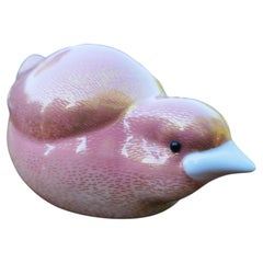 Ceramic bird produced by Mangani Firenze, gold, from the Cucciolotti series.