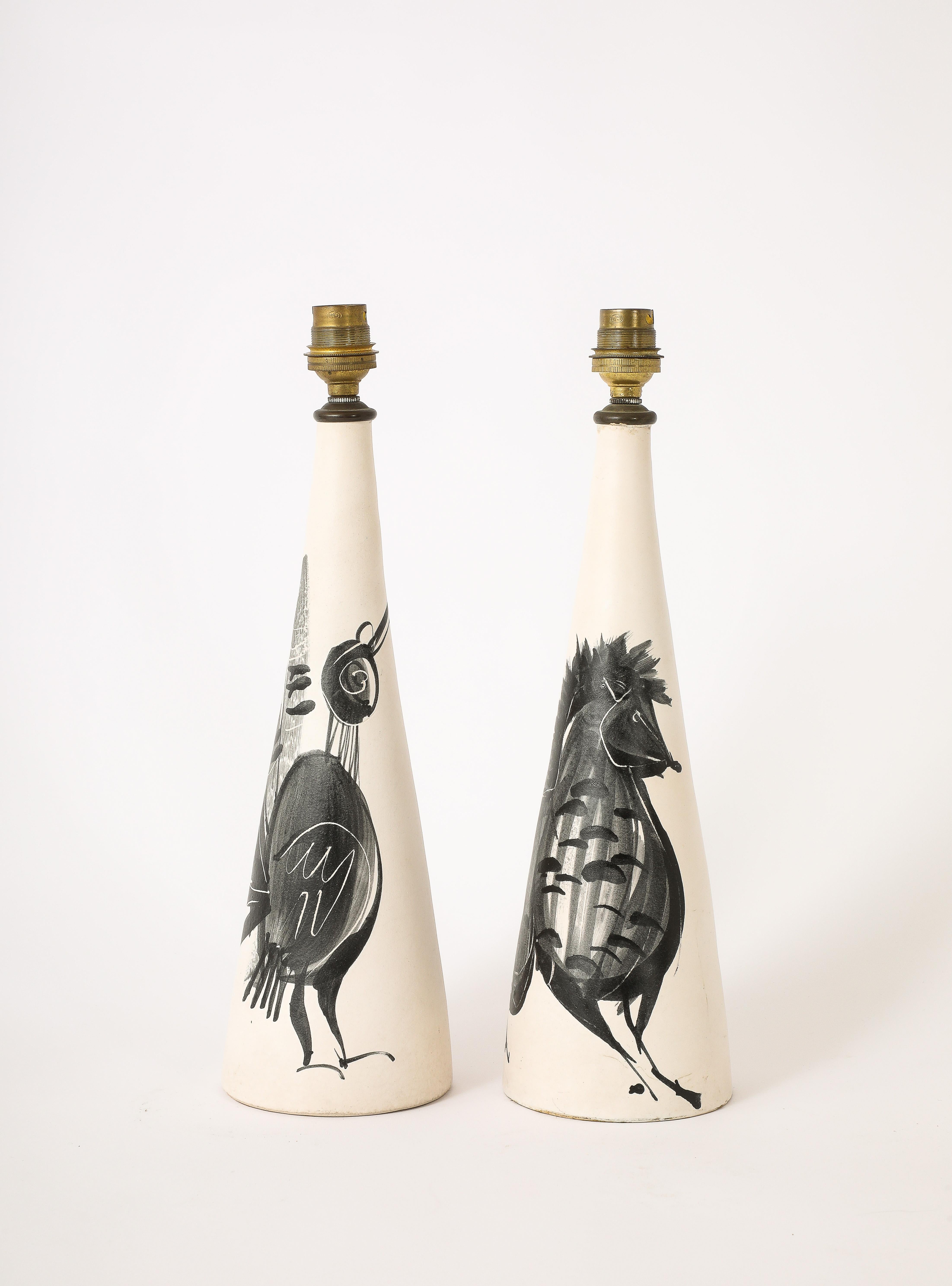 Elegant conical table lamp in eggshell glaze with bird motifs.
