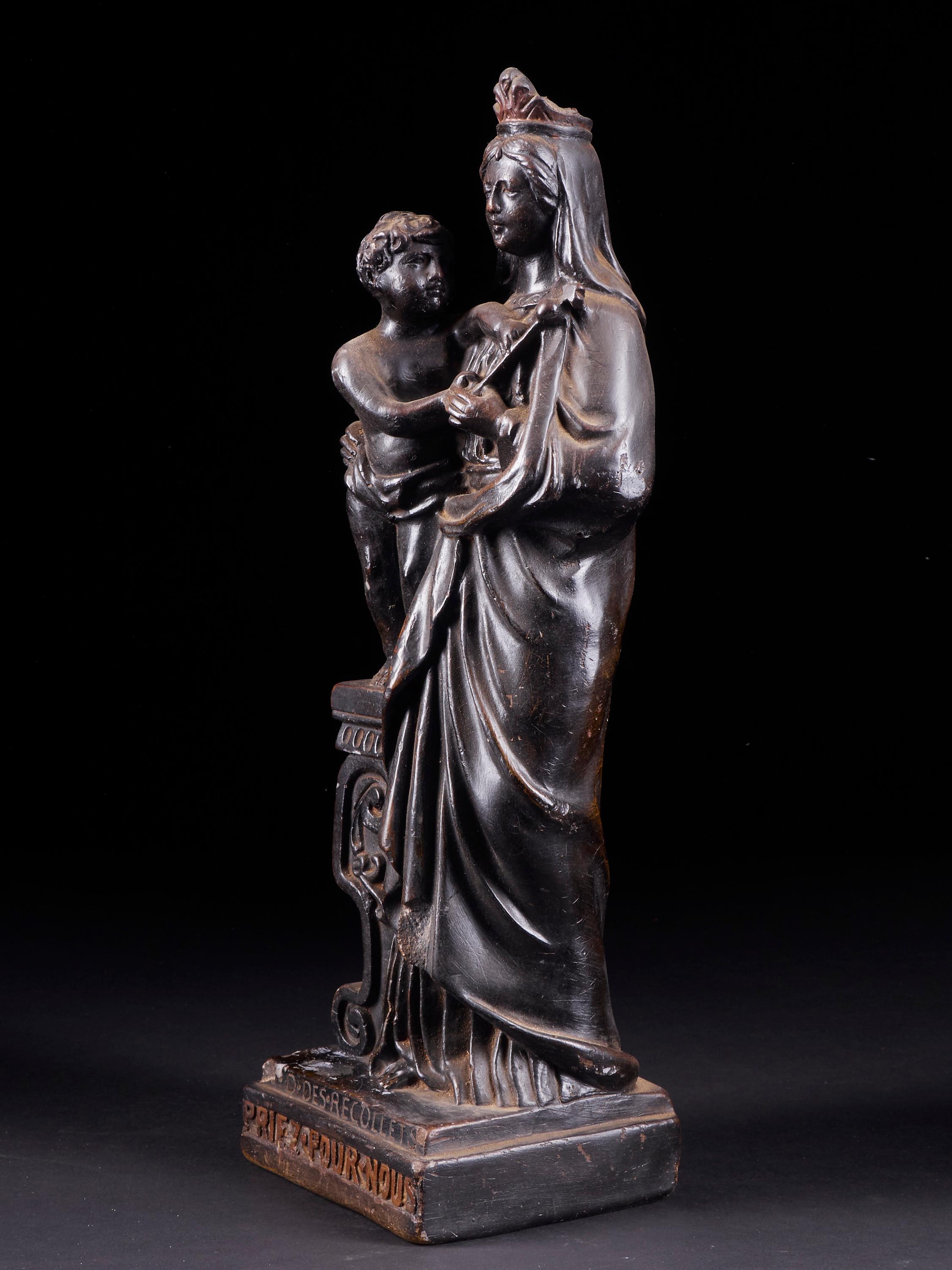 Beautiful black statue crafted in the style of the Miraculous Black Virgin of the Recollets from Verviers parish in Belgium. A signed and marked collectible item.