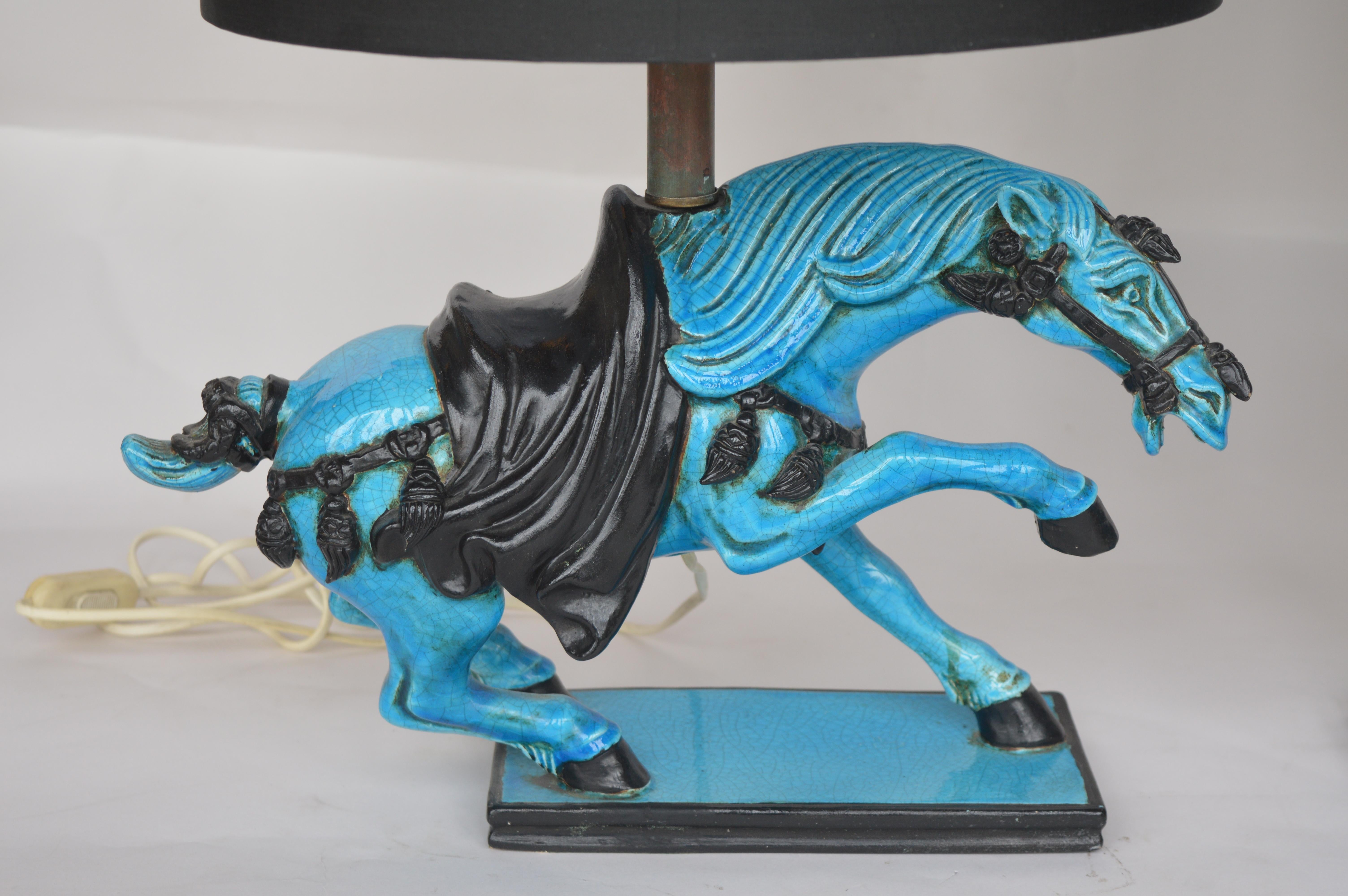 Pair of ceramic blue horse lamps.