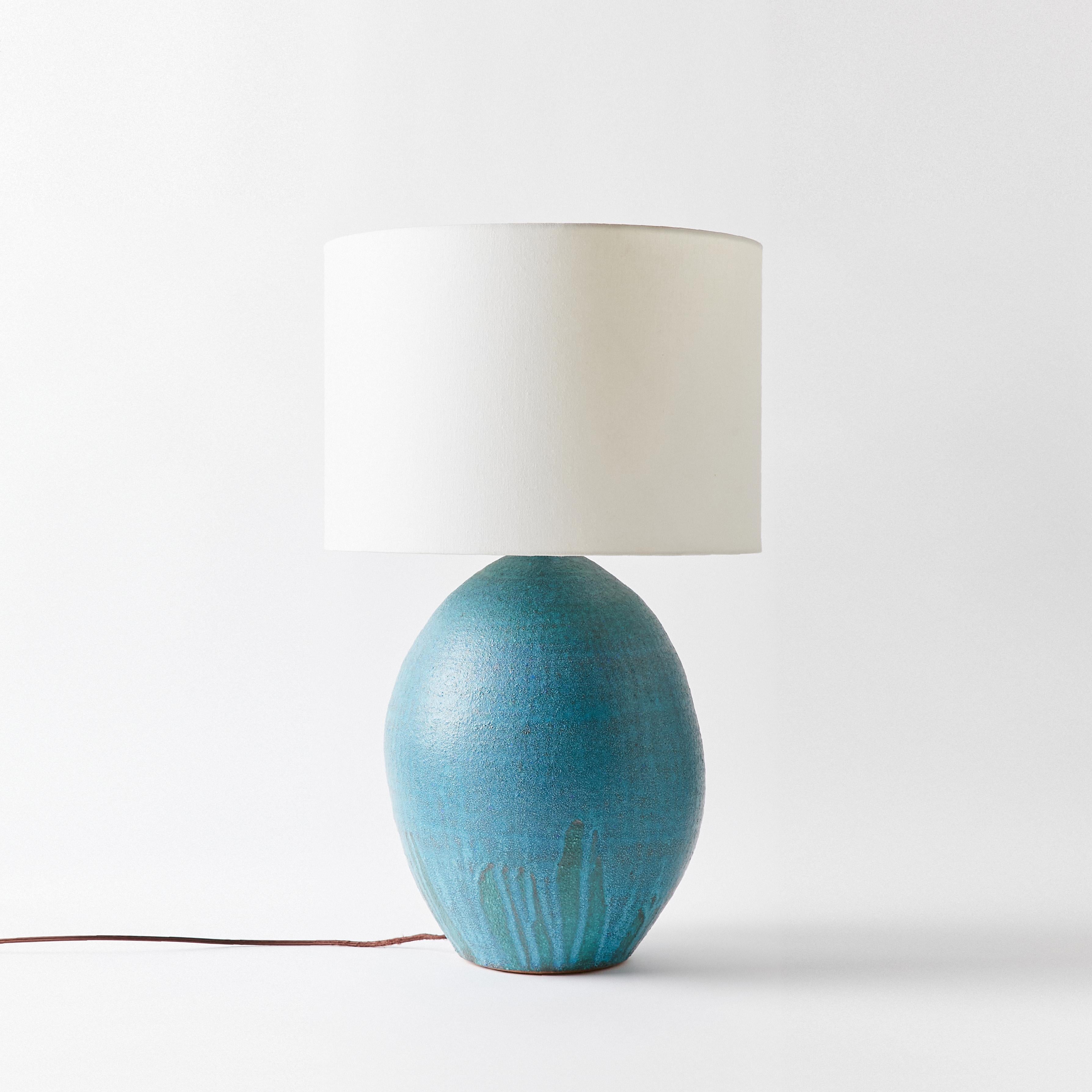 Ceramic cyan blue ceramic lamp by Victoria Morris.