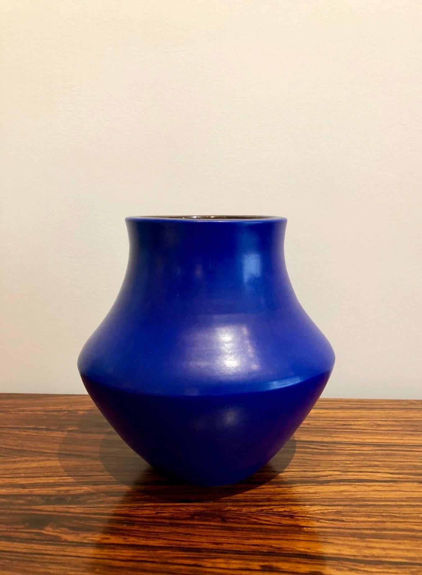 Suzanne Ramie (1907-1974), Vallauris, France

Ceramic vase by renowned French artist Suzanne Ramie´ having an amazing deep blue glaze and black inside.
Incised on the bottom with the artist stamp mark Madoura Plein Feu
Created between end of