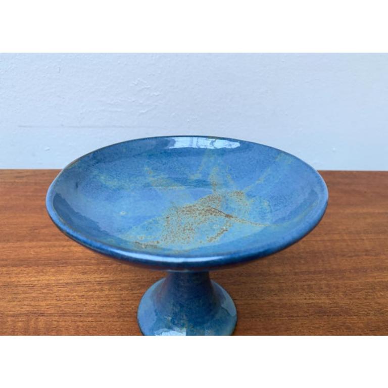 Ceramic Bowl from Ona, in Very Good conditions. Designed 1960 to 1969 This piece has an attribution mark.

Additional information:
Materials: Ceramic
Color: Blue
Styles: Mid-Century Modern
Item Type: Vintage, Antique or Pre-owned
Dimensions: 7.09ʺW