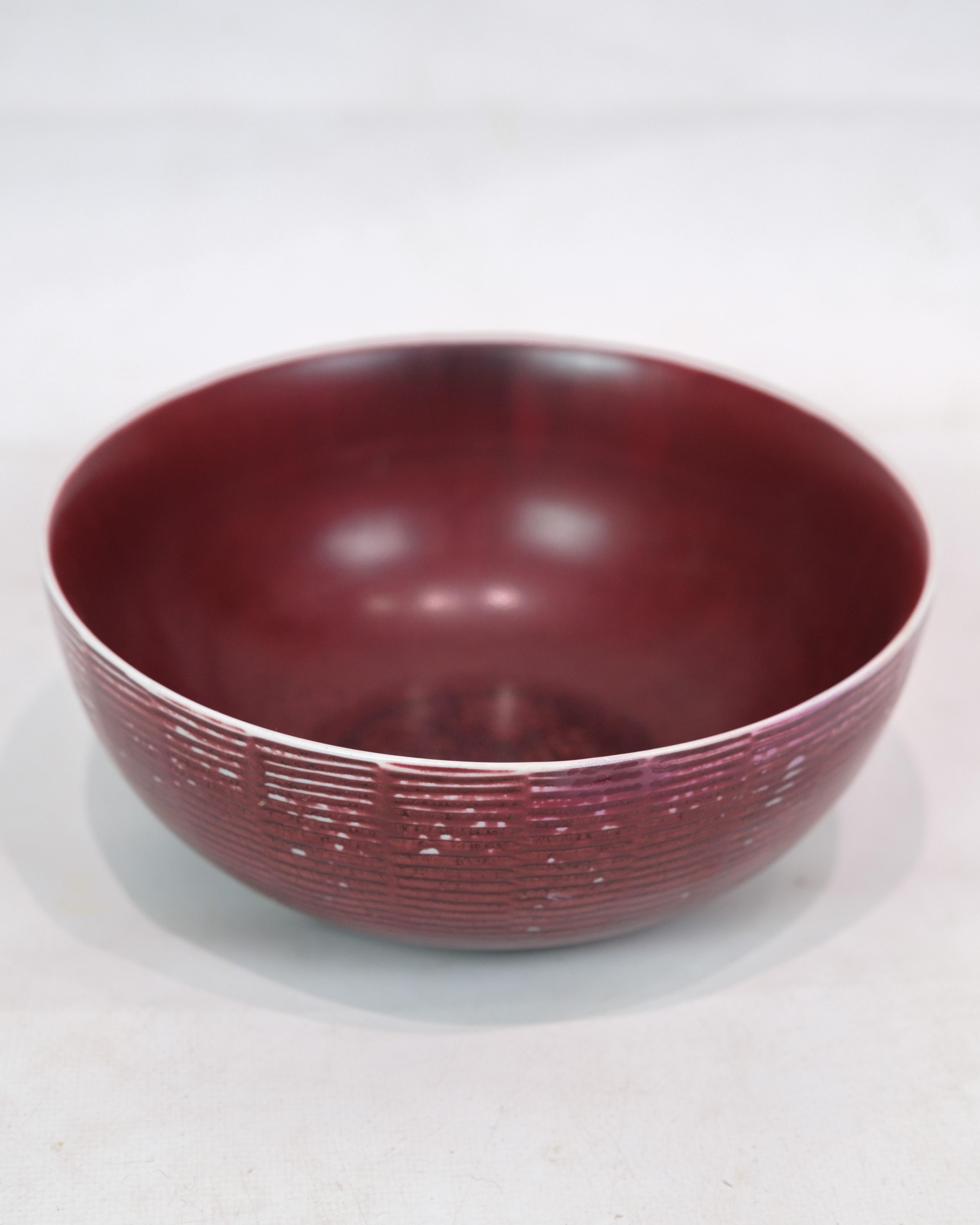 Mid-Century Modern Ceramic Bowl Model 20.717 Made In Oxblood Colored Glaze By Axel Salto For Sale