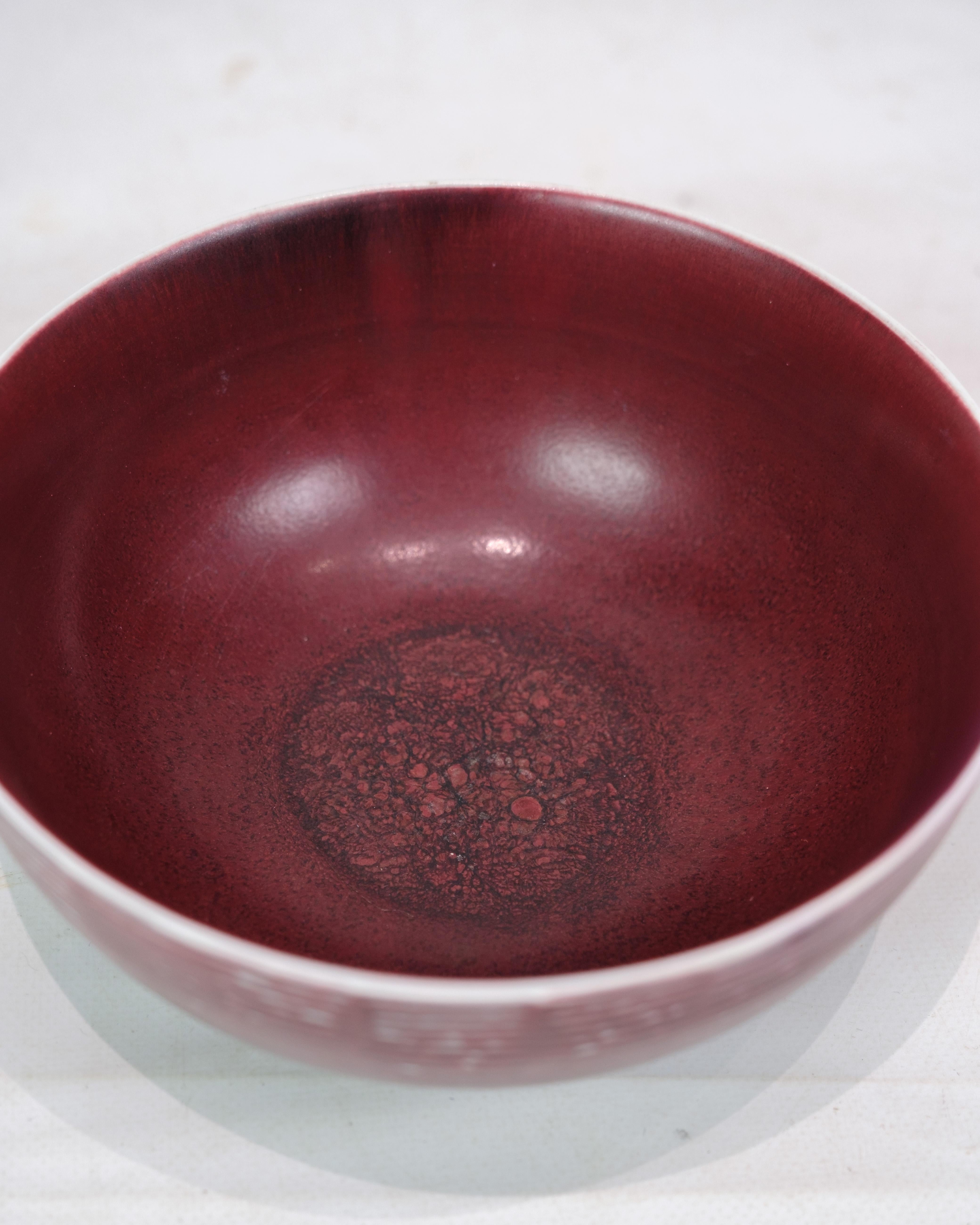 Danish Ceramic Bowl Model 20.717 Made In Oxblood Colored Glaze By Axel Salto For Sale