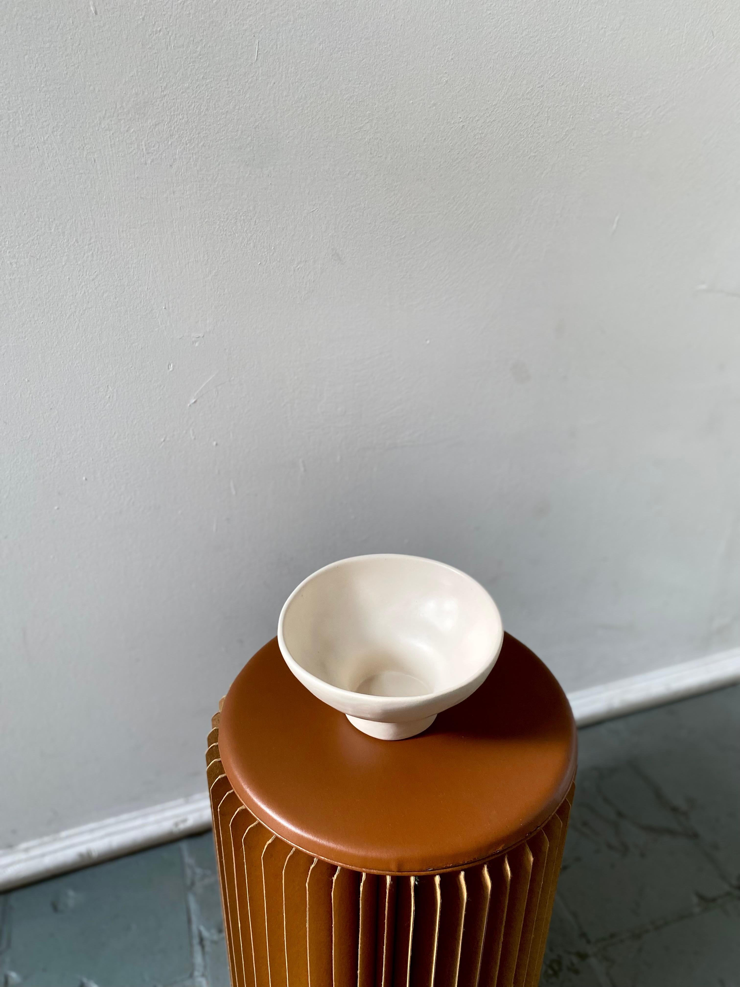 Introducing our handmade ceramic bowl with an organic shape, featuring a matte neutral finish. It's perfect for enjoying ramen and serving fruits. This unique and functional piece adds a touch of charm to any home decor. A versatile addition to your