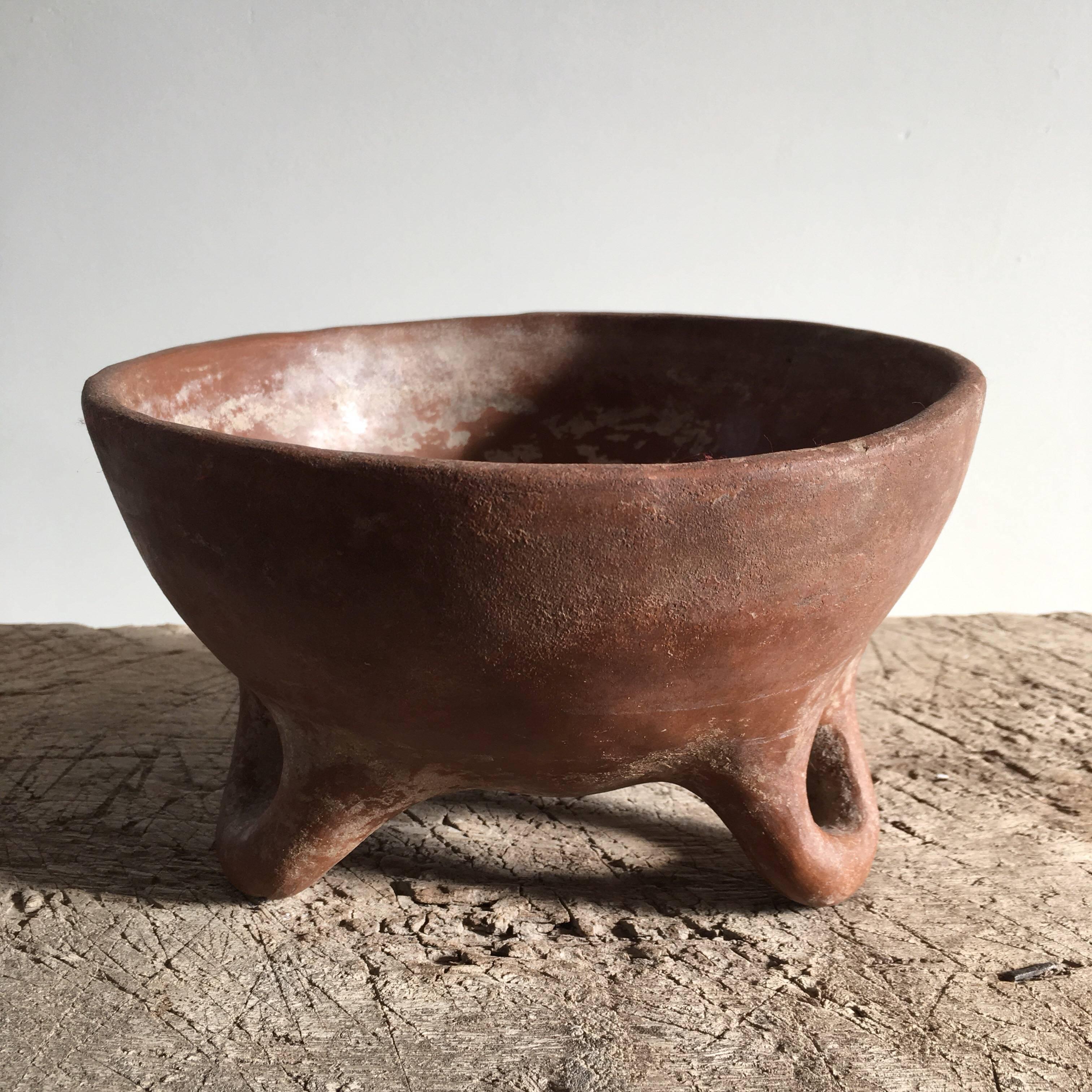 ceramic bowl with legs