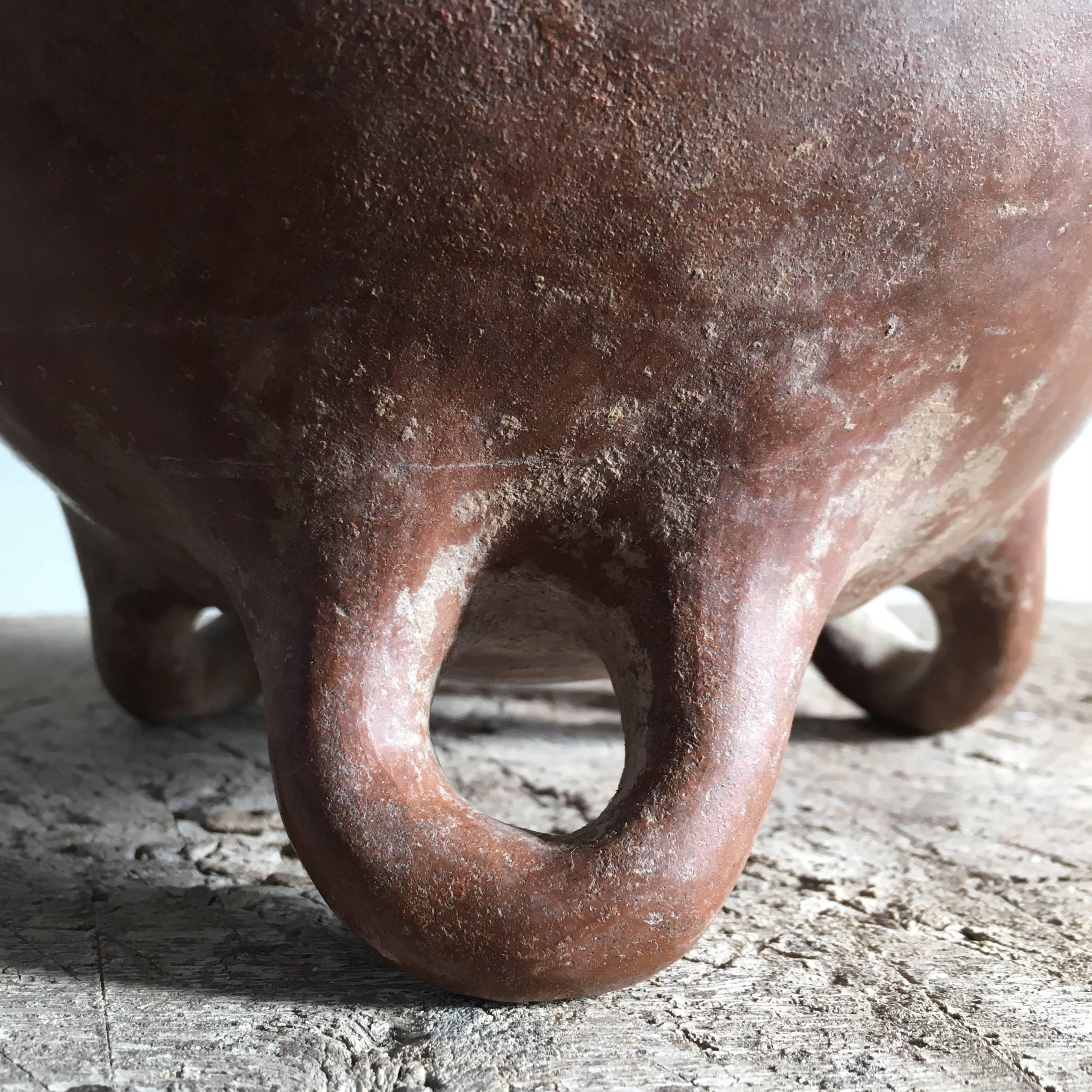 pottery with legs