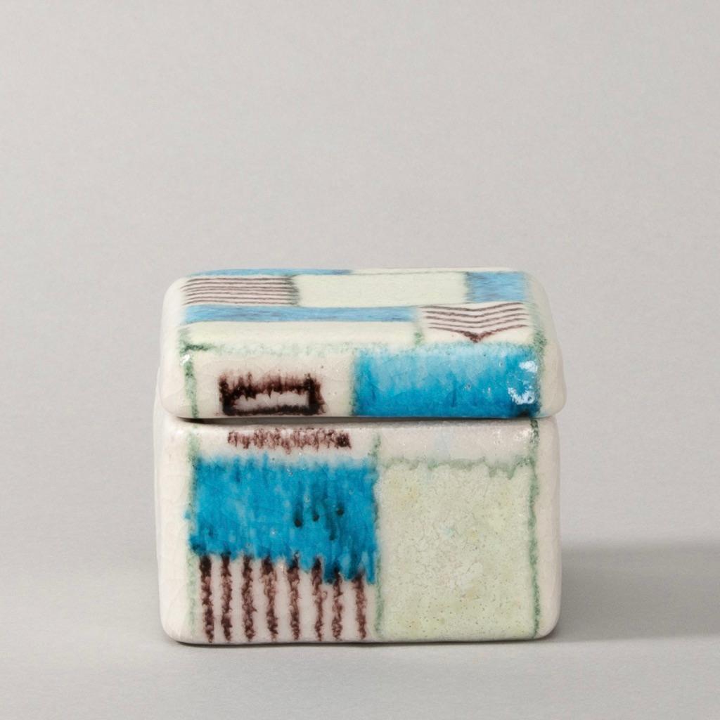 Beautiful ceramic box by Guido Gambone with abstract decor in pale green, dark brown and blue,
circa 1950-1960.

About Guido Gambone
Guido Gambone (1909 Montella IT - 1969 Firenze IT) Guido Gambone is considered as one of the most influential