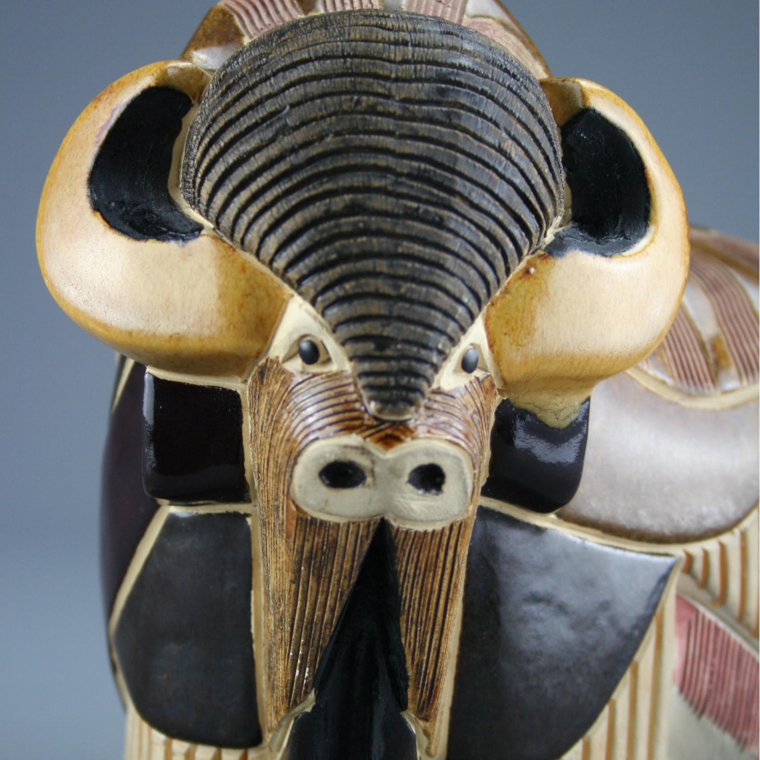 This ceramic vintage buffalo was handmade by Artesania Rinconada, Uruguay in c. 1970’s.

The figurines are carefully hand-carved and detailed in fine grain earthenware ceramic material. After initial kiln firing, coloured slips and enamel glazes are