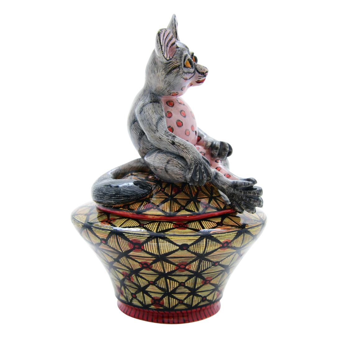 Bush Baby Jewelry Box: Hand-Painted by Winnie and Sculpted by Sbusiso

The Bush Baby Jewelry Box is a captivating piece of ceramic art from South Africa, showcasing the remarkable talents of artisans Sbusiso and Winnie at Love Art Ceramic. Measuring