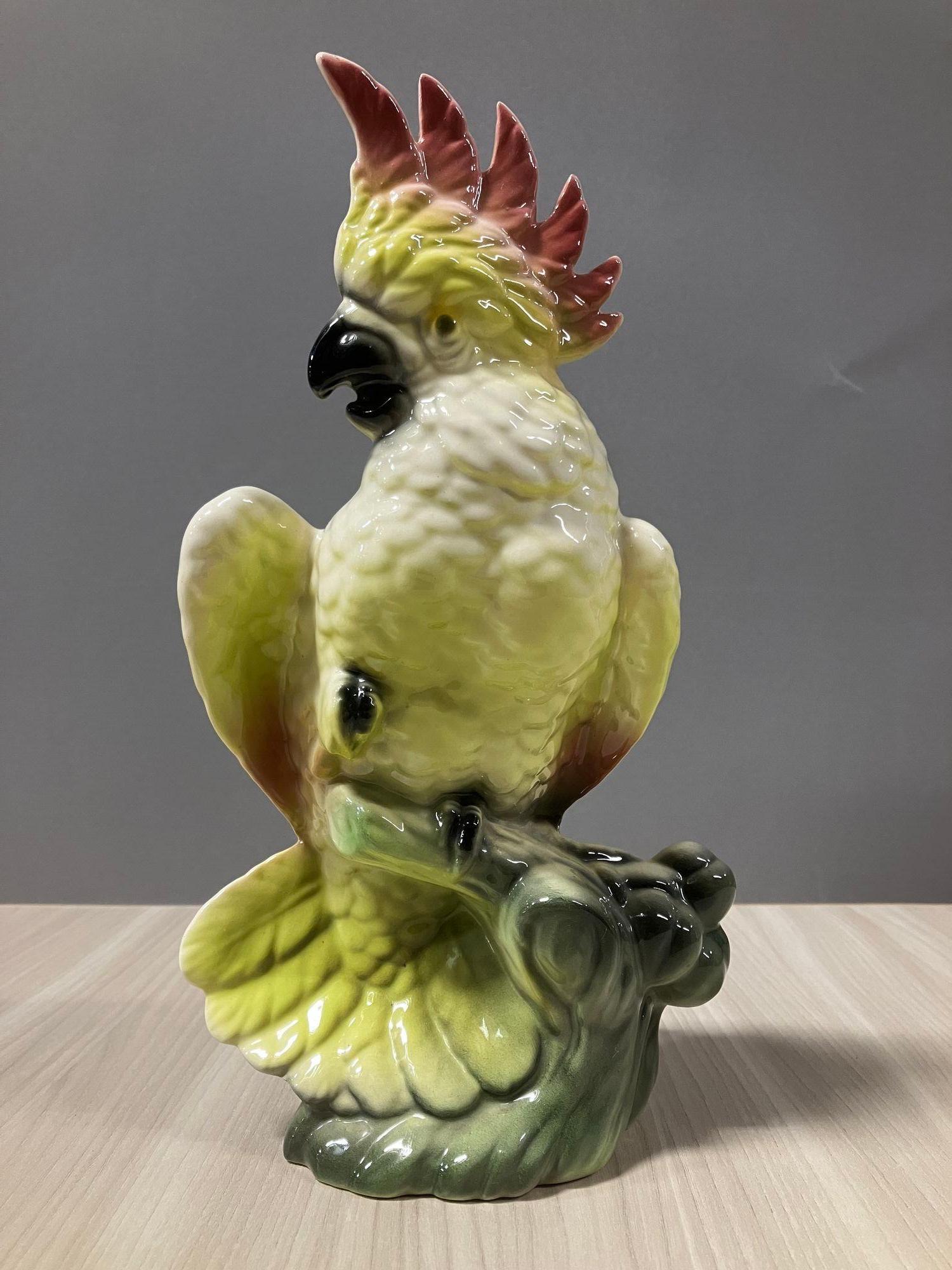 Early Mid-Century Ceramic Tropical Cockatoo on a Branch with small planter opening by Fame California Potter William Maddux. A great example of Hawaiian mania that swept the USA After WWII with many American troopers fighting on the Pacific front
