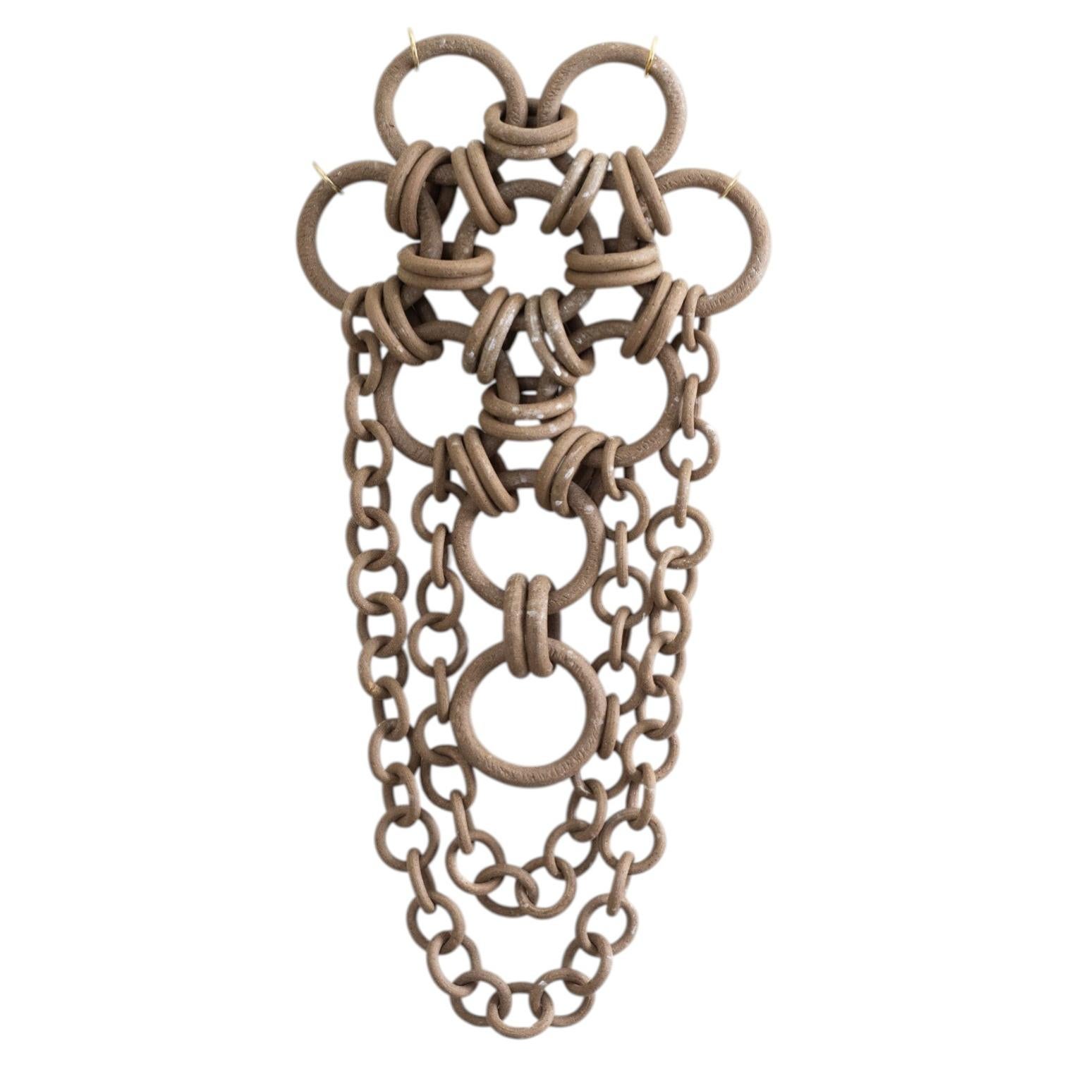 Ceramic chainmail sculpture