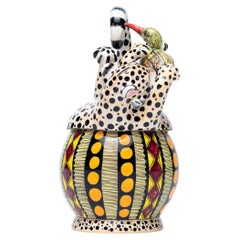 Portagioie in ceramica con ghepardo e uccello  , realizzato a mano in Sudafrica