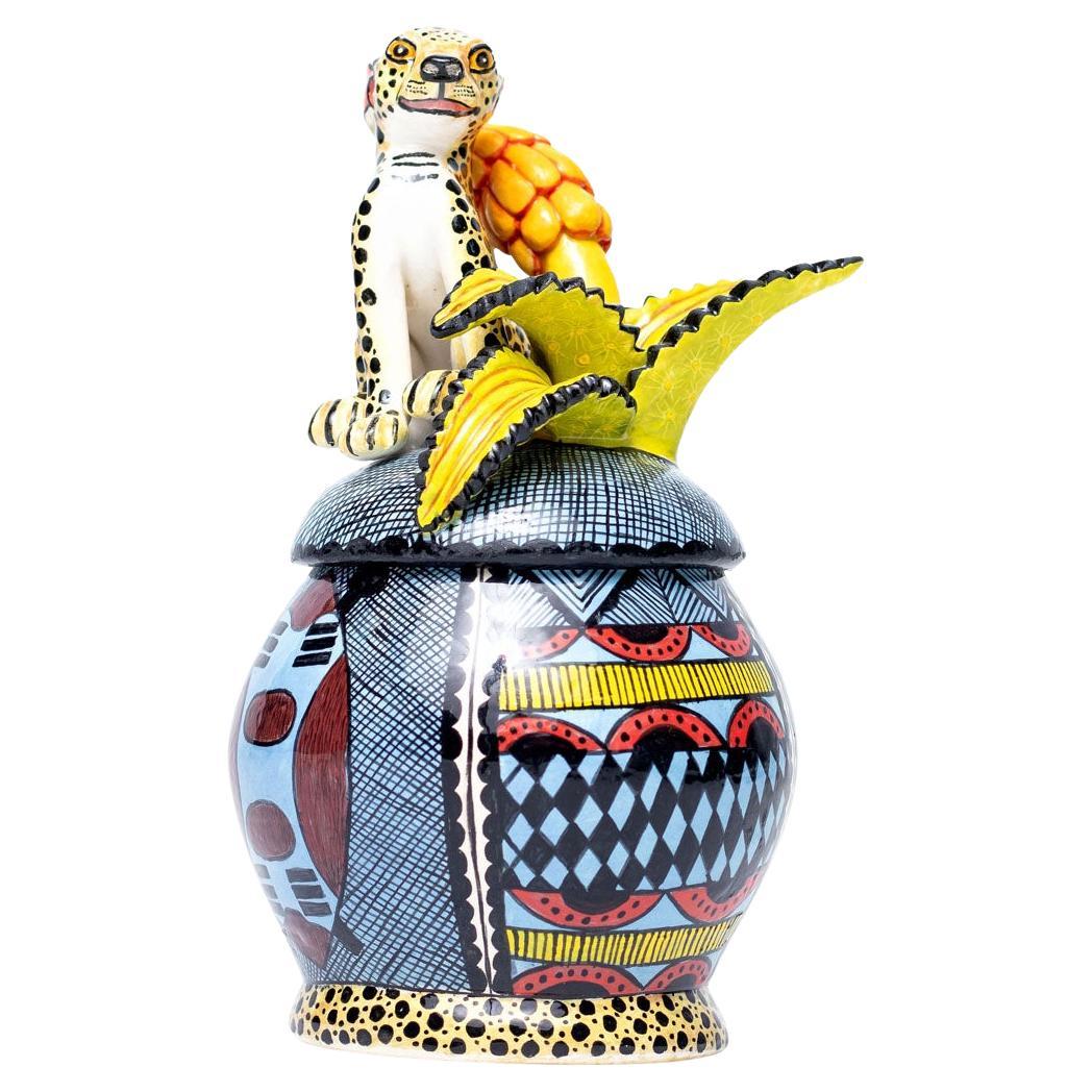 Cheetah Jewelry Box Hand Painted by Slie and Sculpted by Sbusiso
Experience the elegance of South Africa with the exquisite Cheetah Jewelry Box, a beautifully crafted piece from Love Art Ceramic. Hand-painted by the talented Slie and expertly