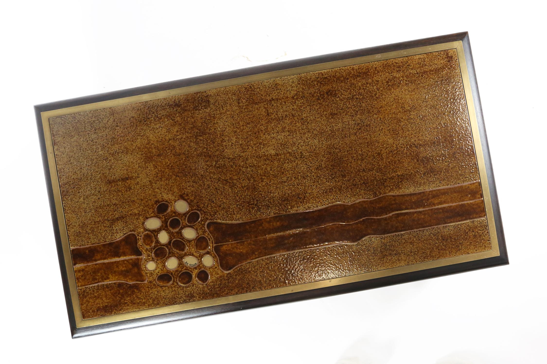 Coffee table with wooden and brass base and 1-piece ceramic top designed and signed by Belgian/ Italian artist Denisco in very good condition.