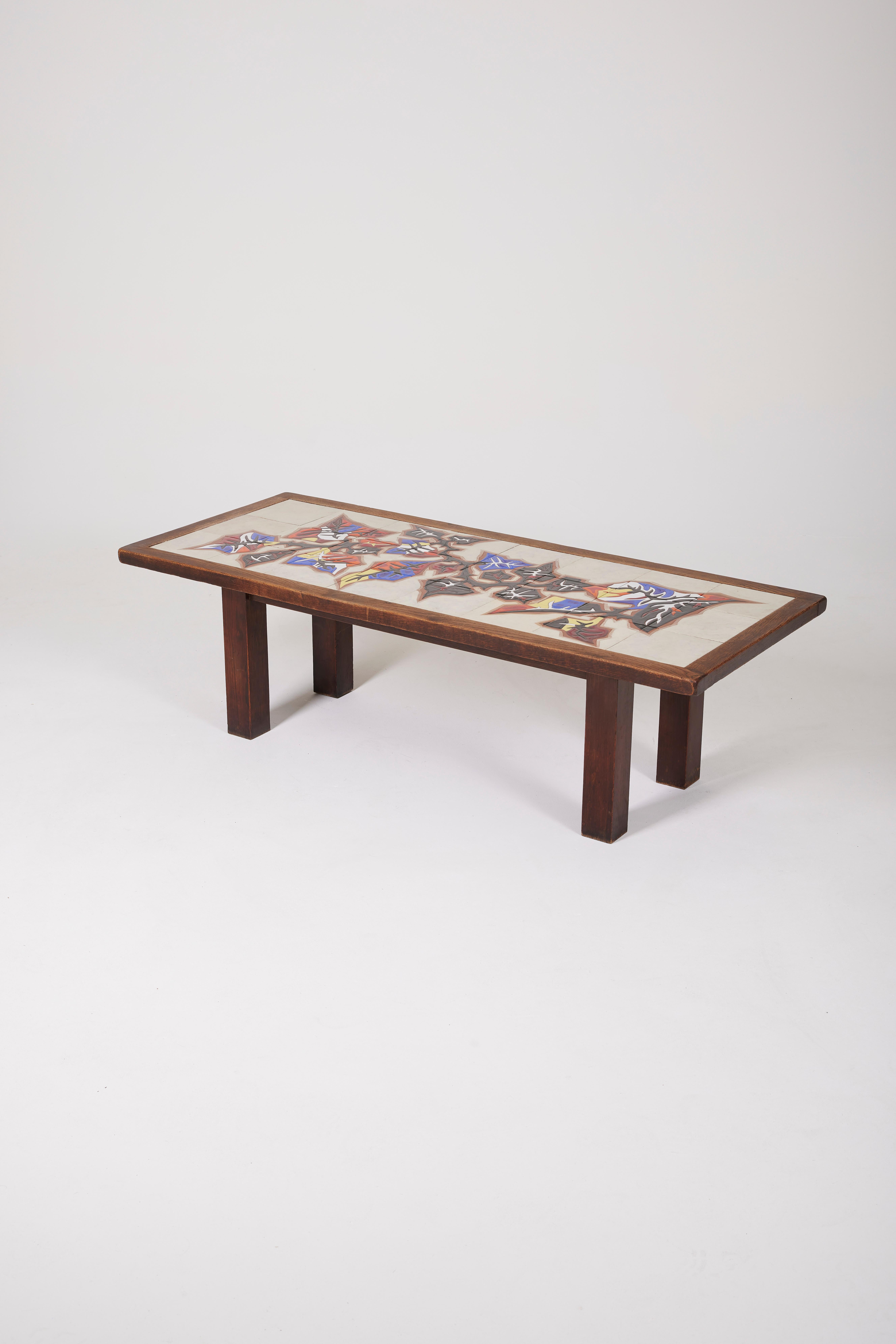 Coffee table in ceramic by the French ceramist Jean Lurçat (1892-1966), dating from the 1950s. The tabletop features white ceramic with yellow, red, and blue floral patterns, while the structure is made of wood. In very good condition.
LP1337