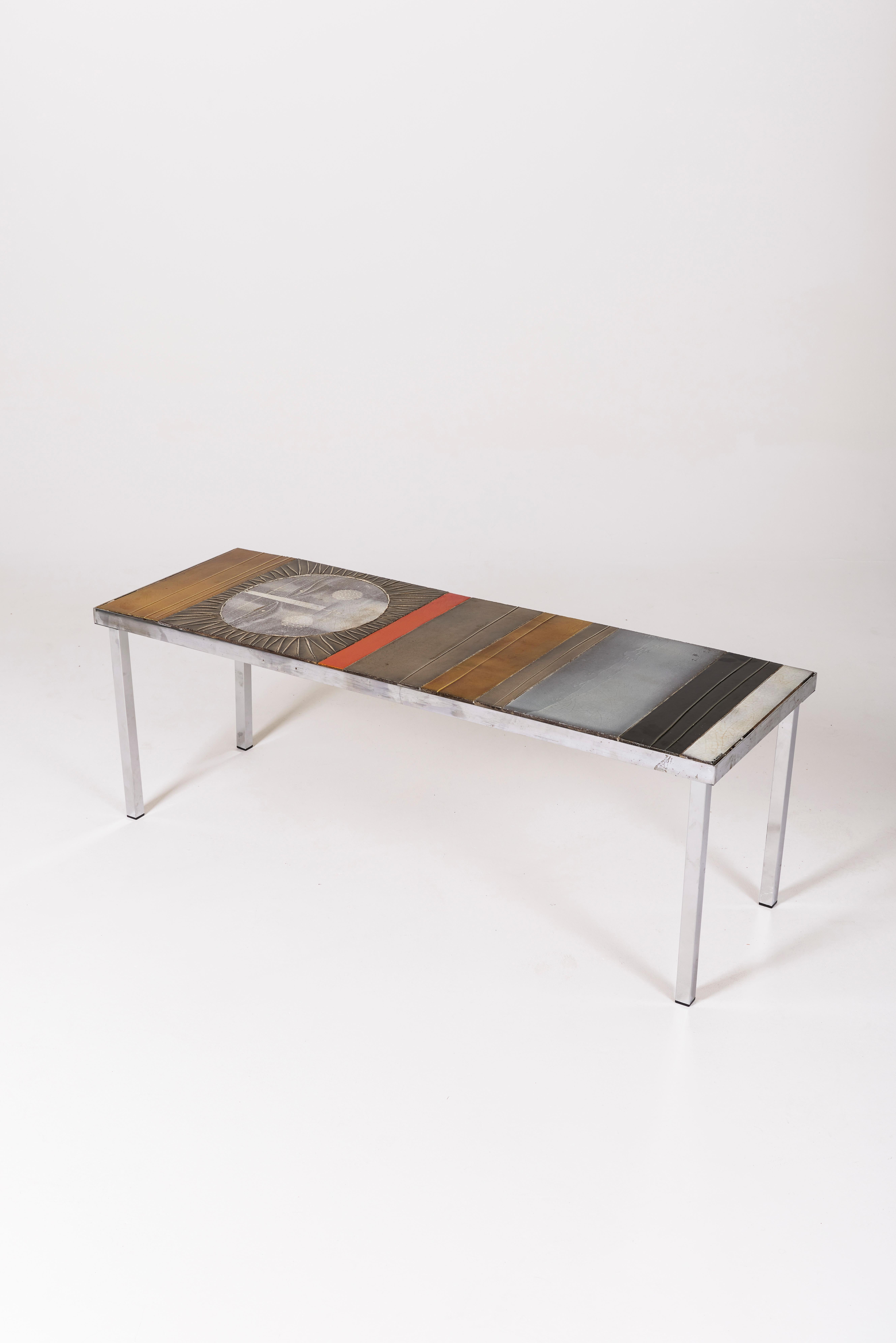 Coffee table, Soleil model, by Roger Capron, 1960s. Ceramic tabletop with a sun motif. The base is made of chromed metal. Excellent condition.
LP1254
