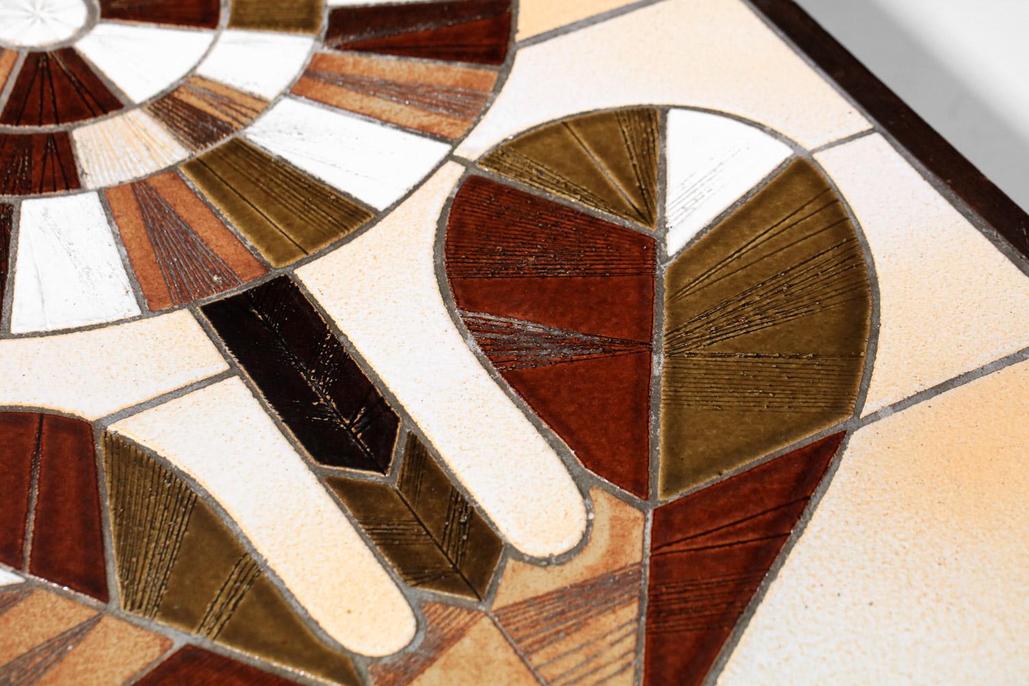 Coffee table designed by the famous French ceramist Roger Capron in the 60s. Structure in solid wood and plywood, top composed of glazed ceramic tiles forming a flower. Very fine vintage condition, with slight traces of age and use (see photos).