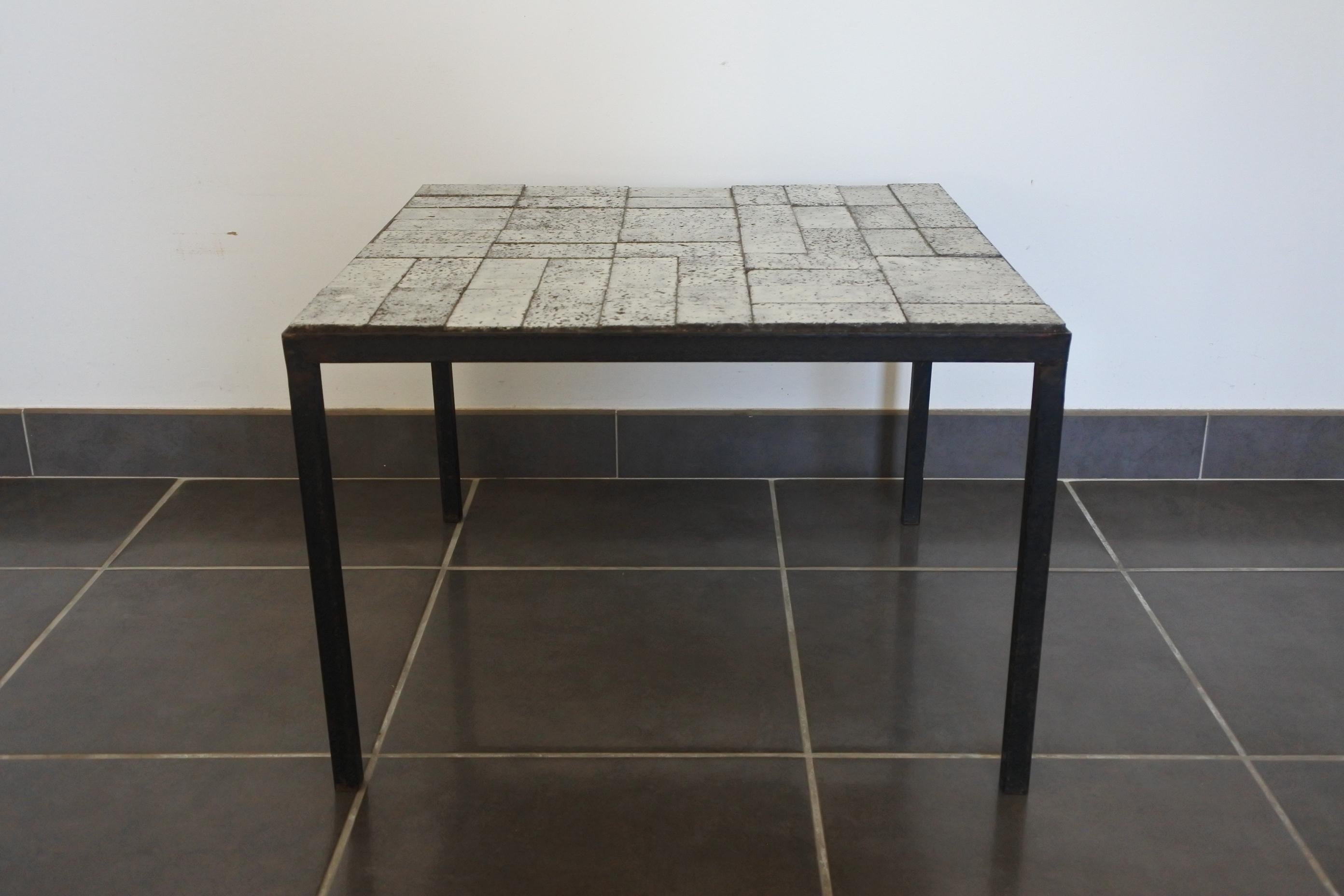 Ceramic coffee table.
Geometrical pattern.
Made in France in the 1950s.
Could also be used as an end table.
 