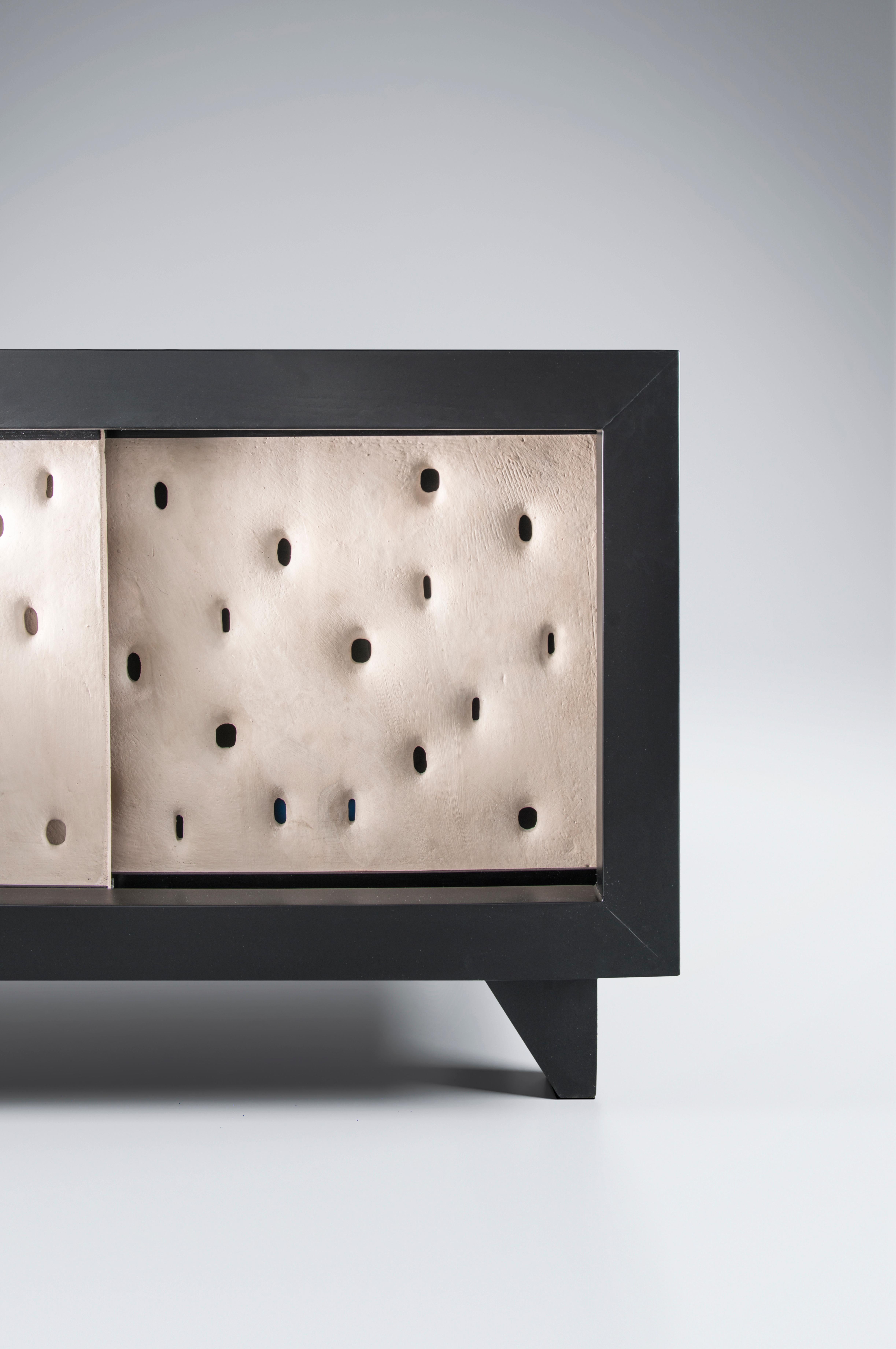 Ceramic contemporary cabinet by FAINA
Design: Victoriya Yakusha
Material: Clay, Ash
Dimensions: 175 x 50 x H 58.5 cm

Made in the style of ethnic minimalism, the collection items introduce “naive design”- simple in form, yet with a deep philosophy