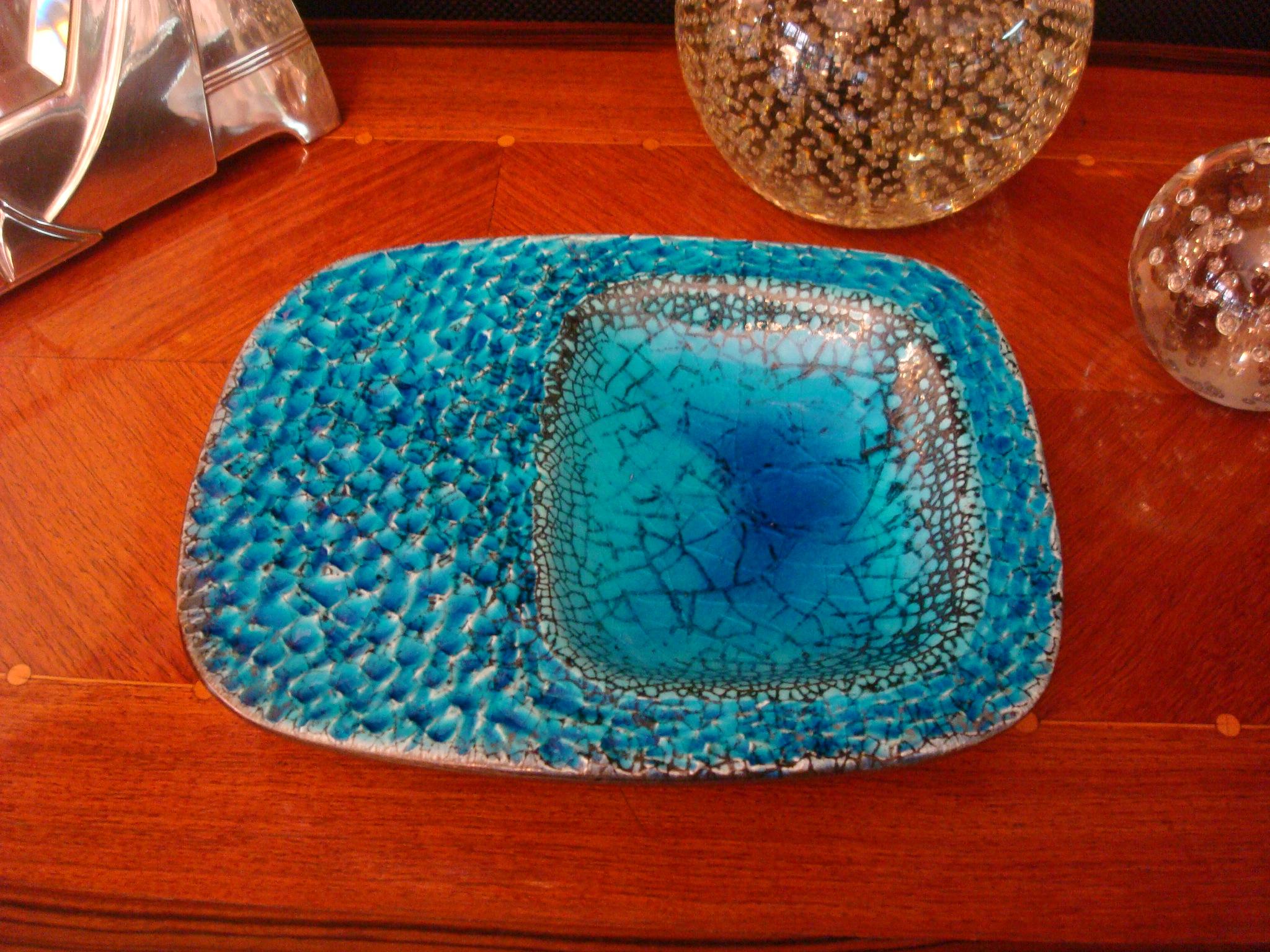 Ceramic Coupe Cendrier or Ashtray in the style of Georges Jouve
Ceramic glazed dish in blue , Unsigned, Manufactured in France, circa 1960.

  
