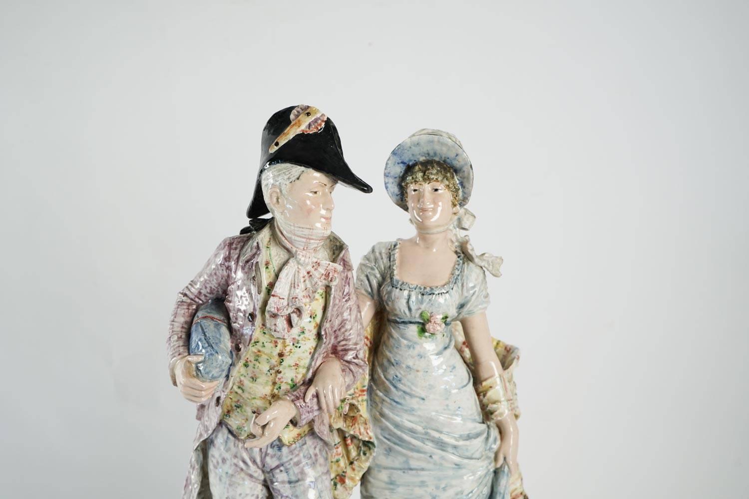 Ceramic couple representing two incredibles, circa 1900.
 