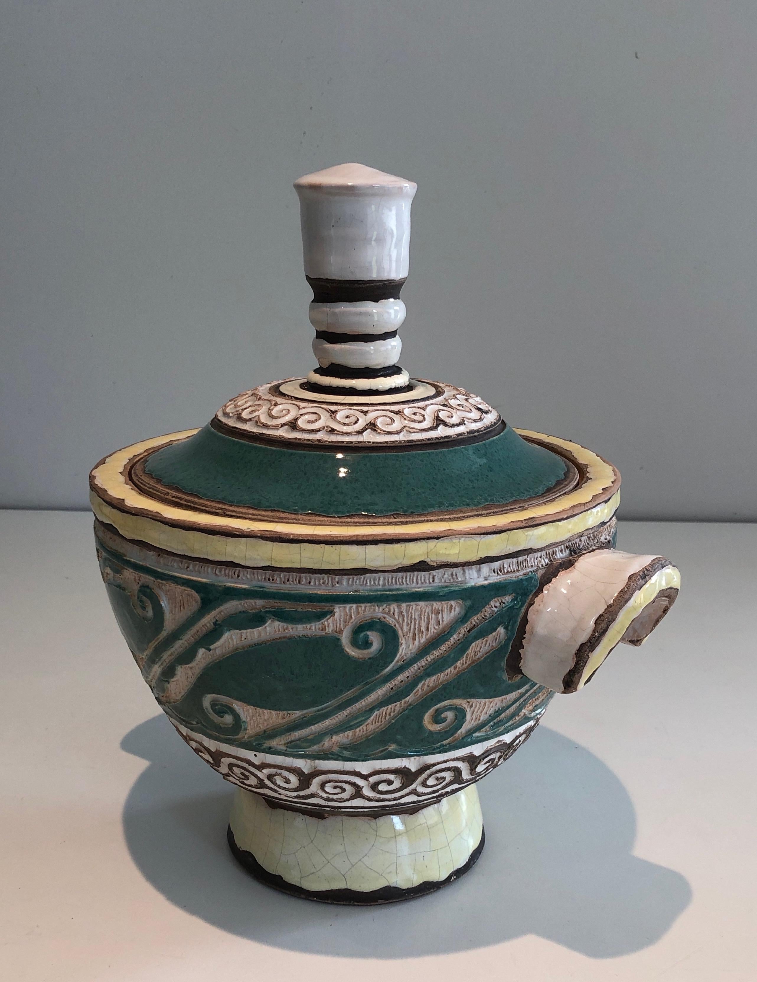 This nice and unusual cover pot is made of ceramic. This is a French work by signed Paul Dordet (1896-1996). Circa 1970
