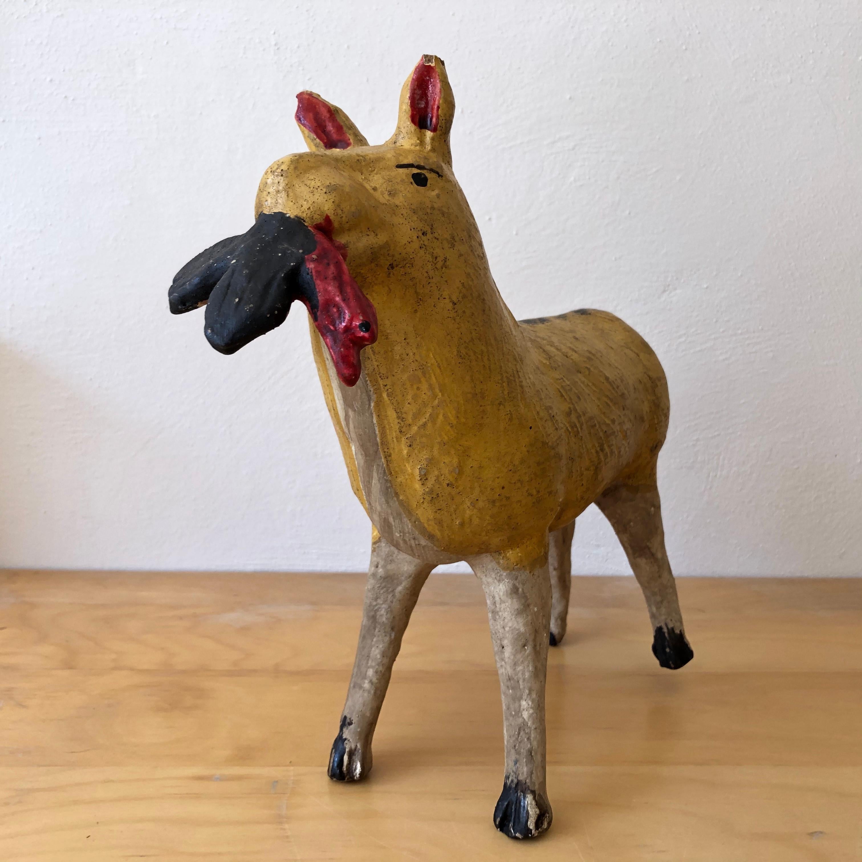 Yellow mustard coyote piggy bank from the border area of the state of Mexico with Guerrero. Classic Folk Art pieces that are very difficult to come by because of their fragile nature, circa 1980s.
