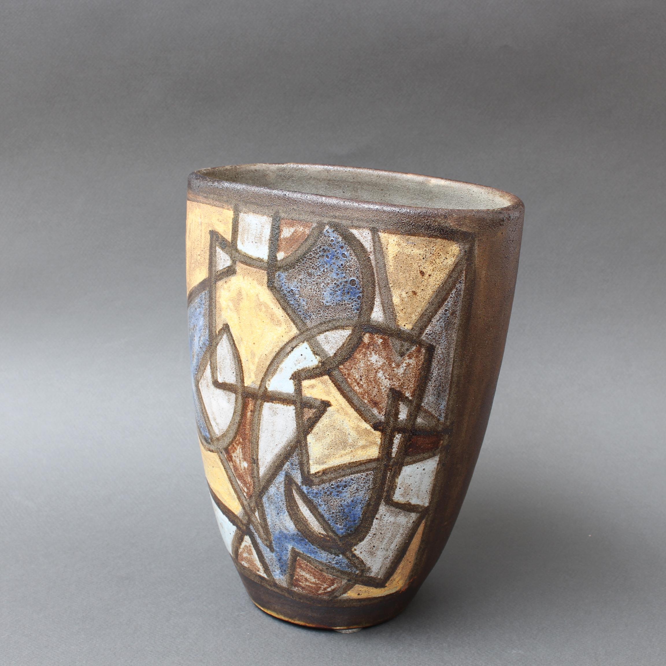 Ceramic decorative vase by Alexandre Kostanda, Vallauris, France (circa 1960s). In his trademark natural clay and rustic style, Kostanda created beautifully original vessels, such as vases, pitchers and pots which were both utilitarian and stunning