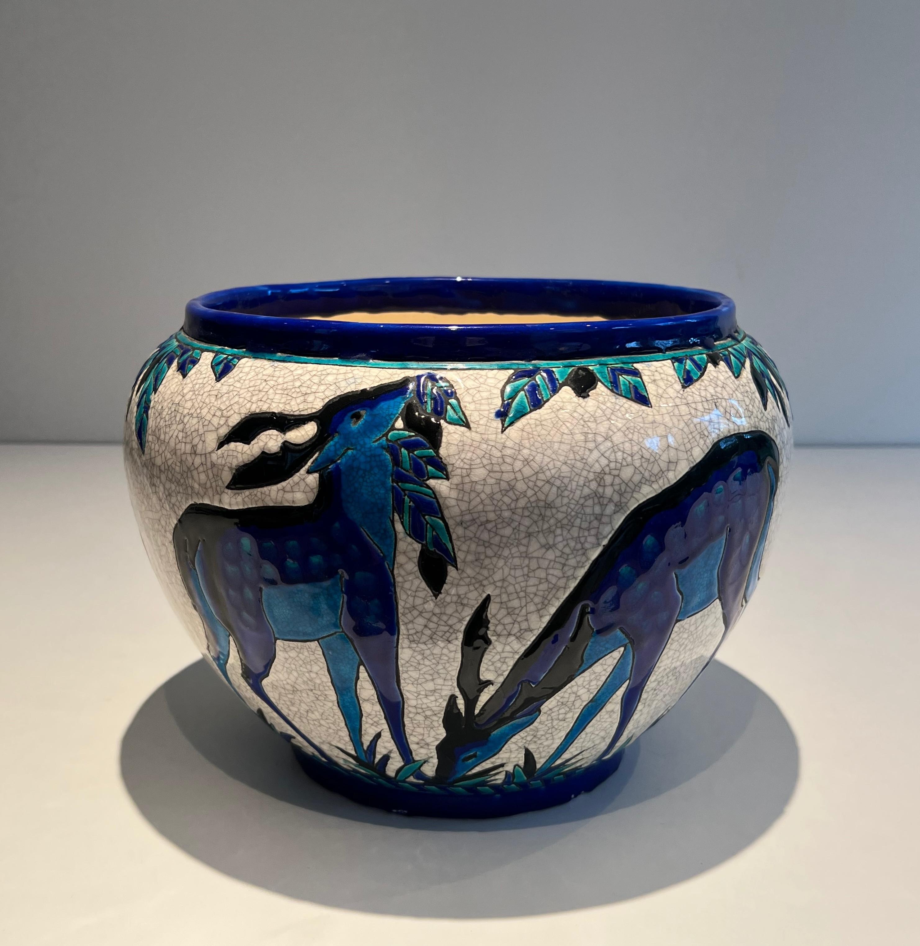 This beautiful “Deer and Doe” planter is made of ceramic. This is a Belgian work signed, marked and numbered by Charles Catteau Keramis Made in Belgium. Art Deco period. Circa 1924