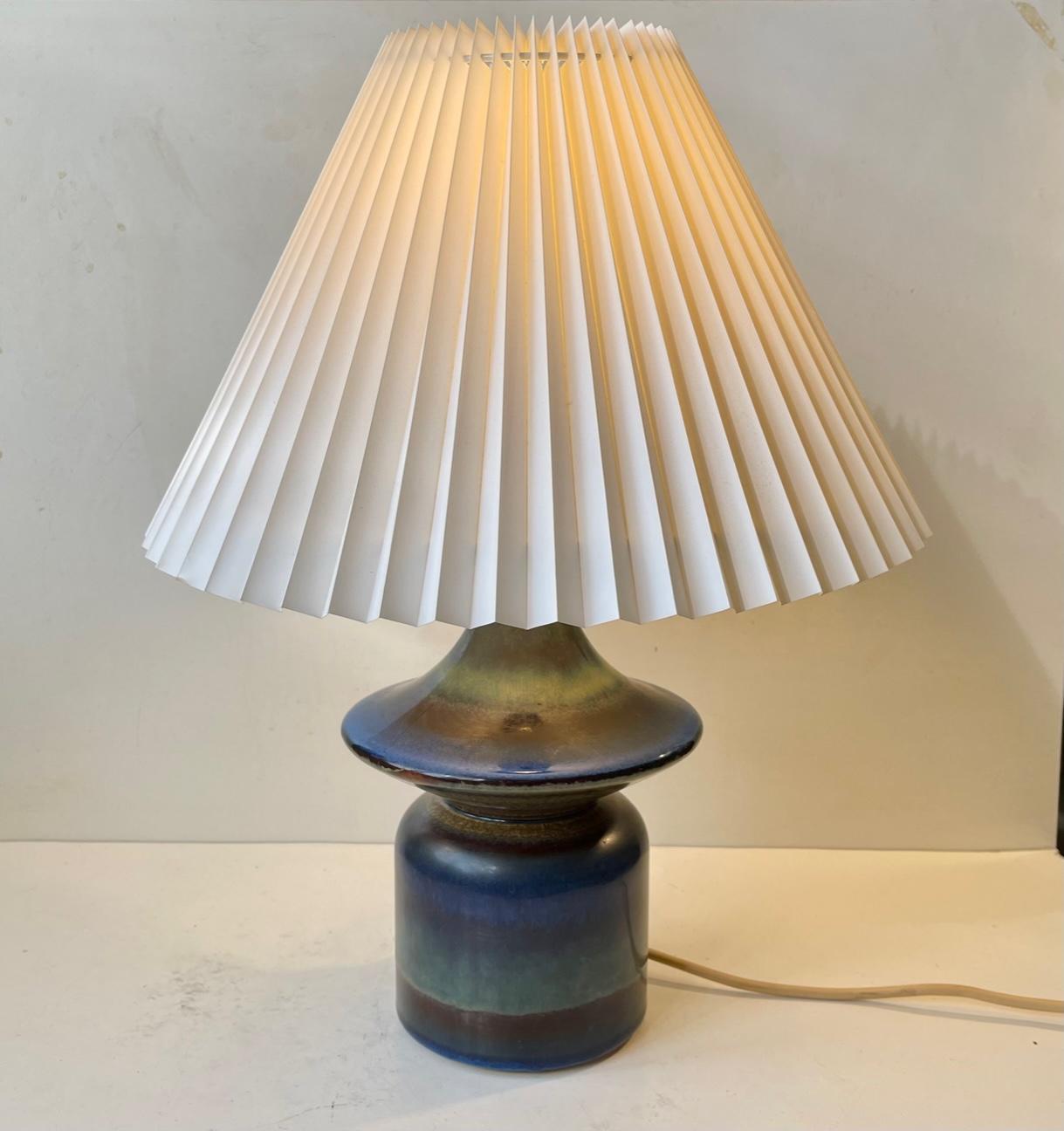 Danish diablo shaped ceramic table lamp with a 'rainbow' of multiple glazes skillfully 'fussioned' together. Much similar to the techniques popularized by Gertud Vasegaard and CH Stalhane. This particular one was made at Søholm in Denmark during the