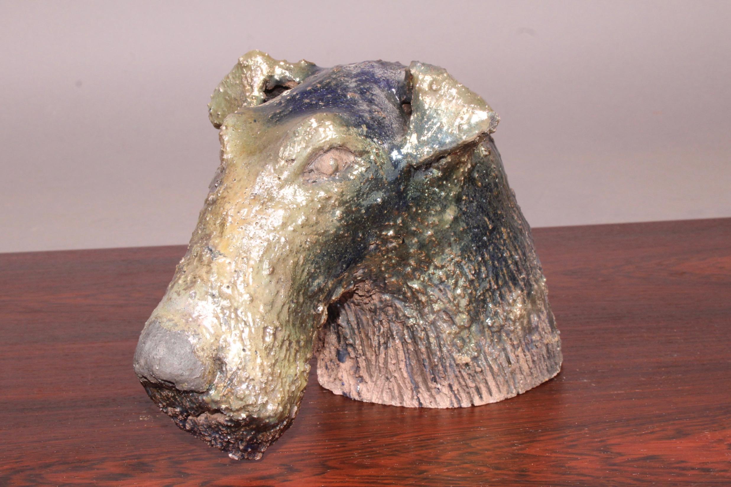 Ceramic dog head.