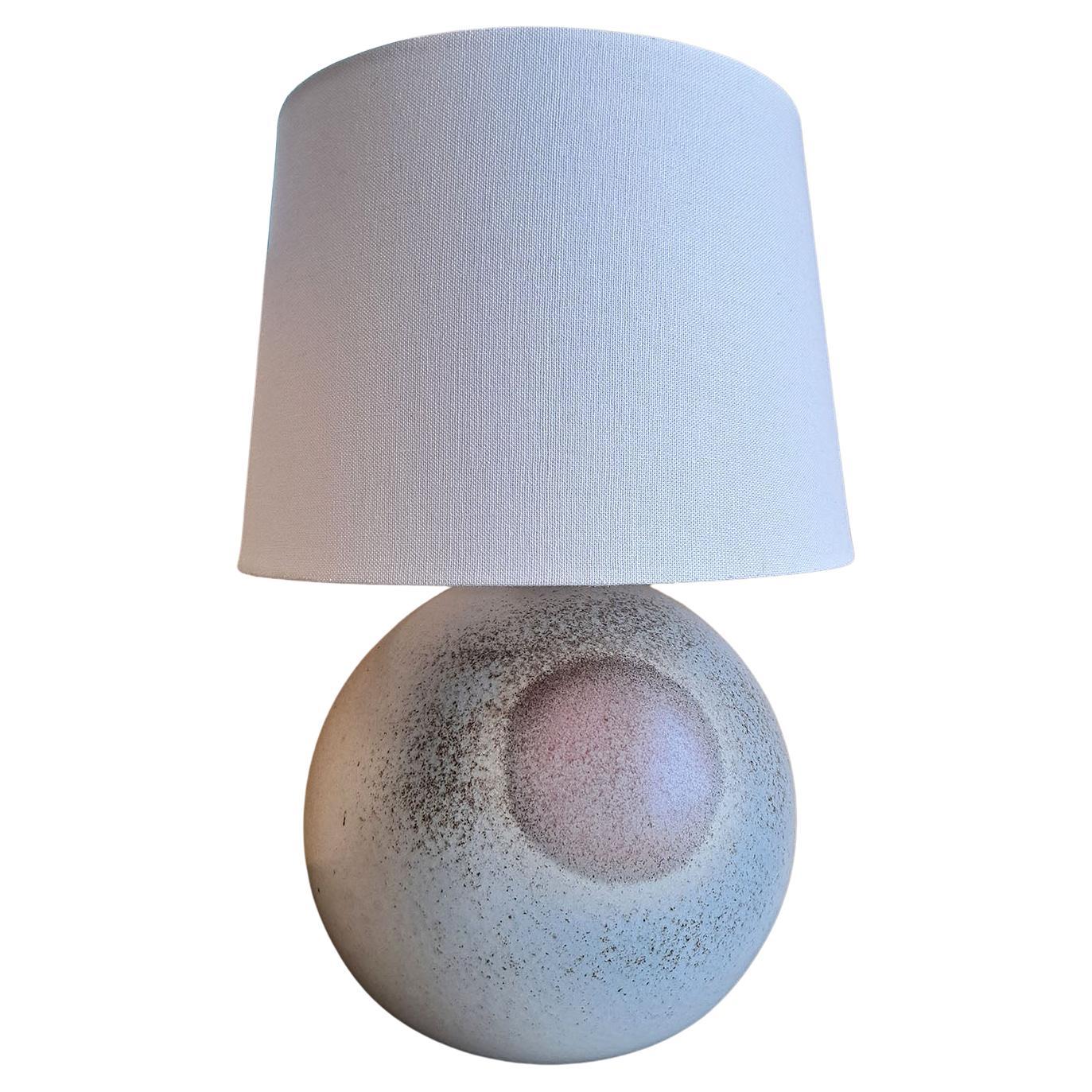 Earthenware Ceramic Lamp by Yves Mohy for Virebent, 1979s. This ceramic table lamp features a circular shape with various colour pigments, showing a darker shade in the middle... Designed by ceramist Yves Mohy for Virebent in the late 70s.

Shade