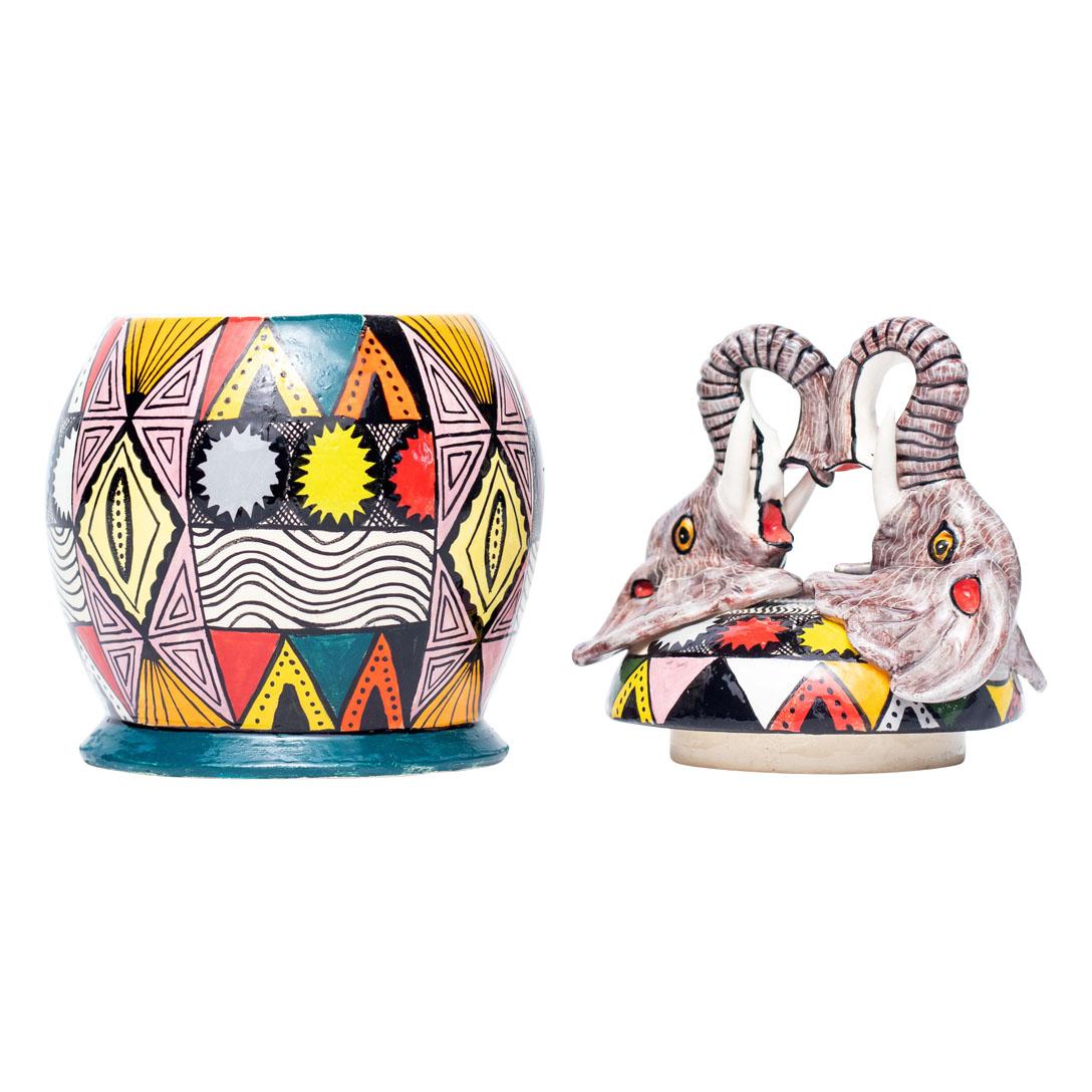 Two Elephant Heads Jewelry Box Hand Painted by Slie and Sculpted by Sbusiso
Discover the charm of South Africa with the exquisite Two Elephant Heads Jewelry Box, a captivating piece crafted by Love Art Ceramic. Hand-painted by the talented Slie and