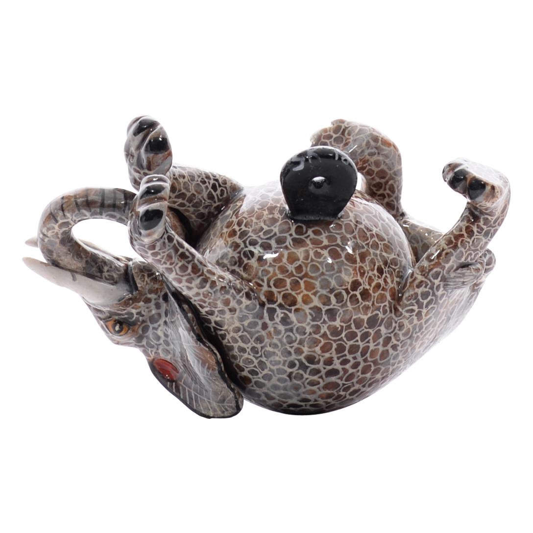Handcrafted by Nozipho Ntshalintshali and sculpted by Sondelani Ntshalintshali at Love Art Ceramic Studio in South Africa, this ceramic Elephant ornament is a delightful representation of African wildlife. Measuring 2 inches tall, 3 inches long, and