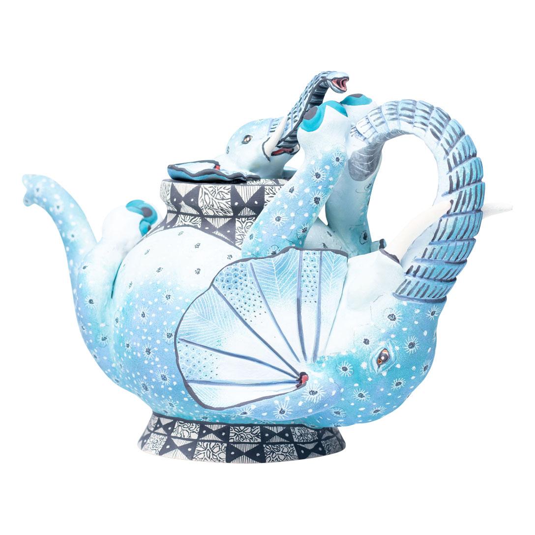 Elephant Teapot
Hand-Painted by Swelihle Khanyeza, Sculpted by Sfiso Mvelase
Love Art Ceramic, South Africa, 2024

Introducing the Elephant Teapot, a stunning ceramic piece that beautifully captures the essence of South Africa’s rich wildlife and