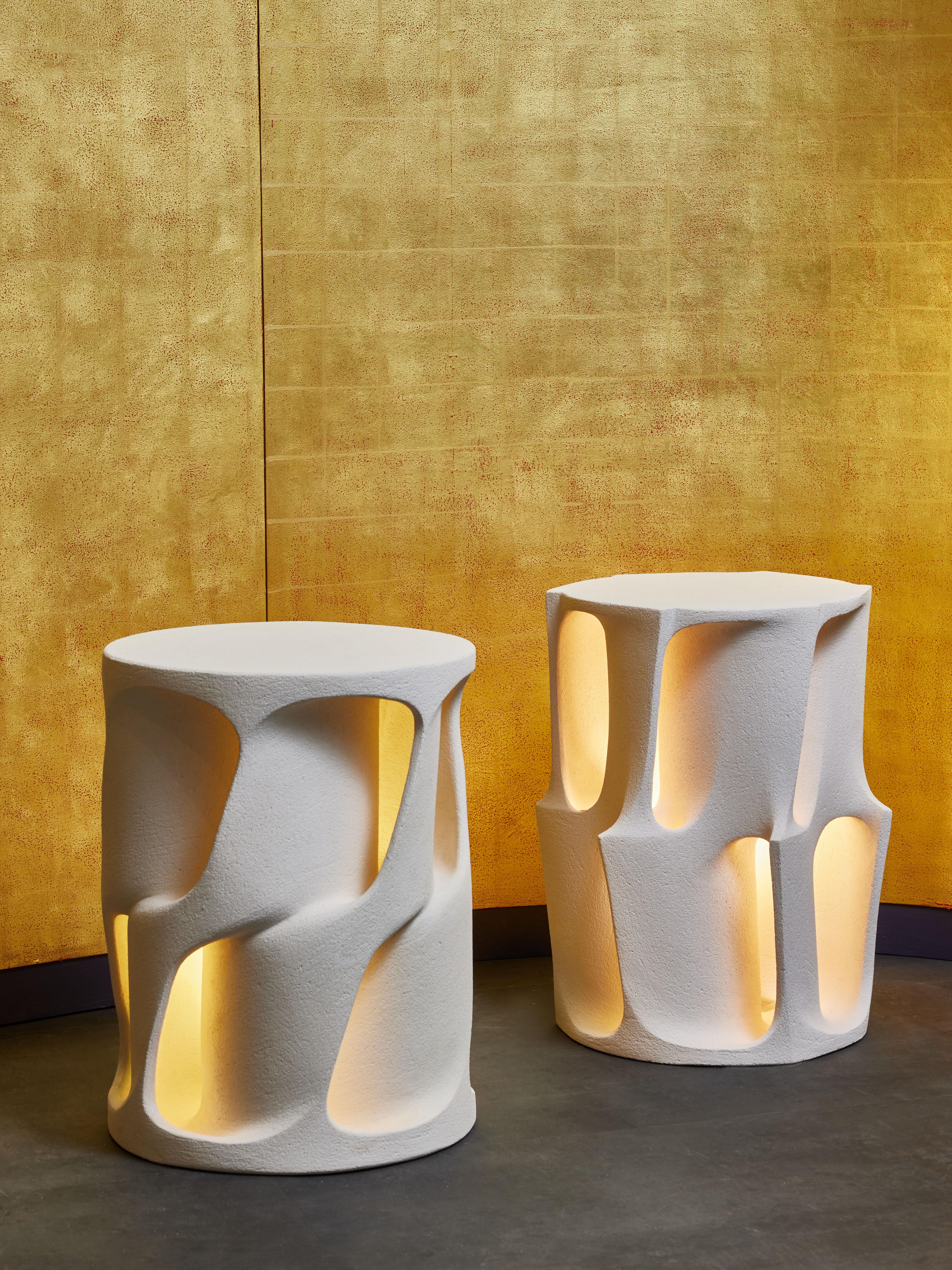 Enlighten ceramic pieces by Guy Bareff, that could be used as stools, side tables floor lamps or table lamps.

Each piece is made of a single bloc of ceramic with side vents to let the light go through.

Signed and numbered

GUY BAREFF – Born in