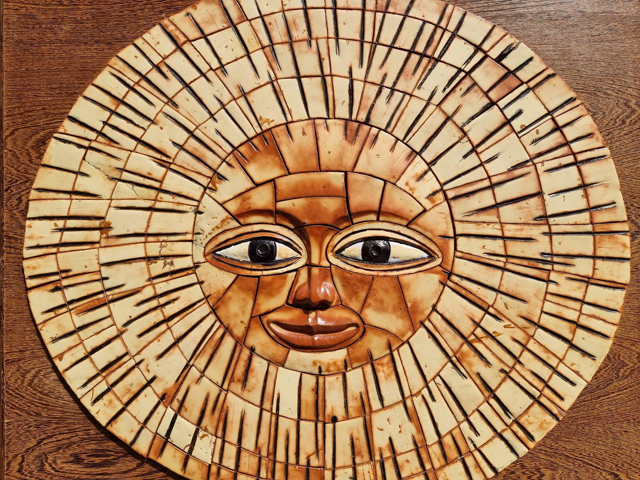 Large Mid-20th century ceramic figural sun face wall art sculpture.The ceramic Face Sun is amazingly detailed in vibrant colors and will make a great addition to any home.

Width 39.7