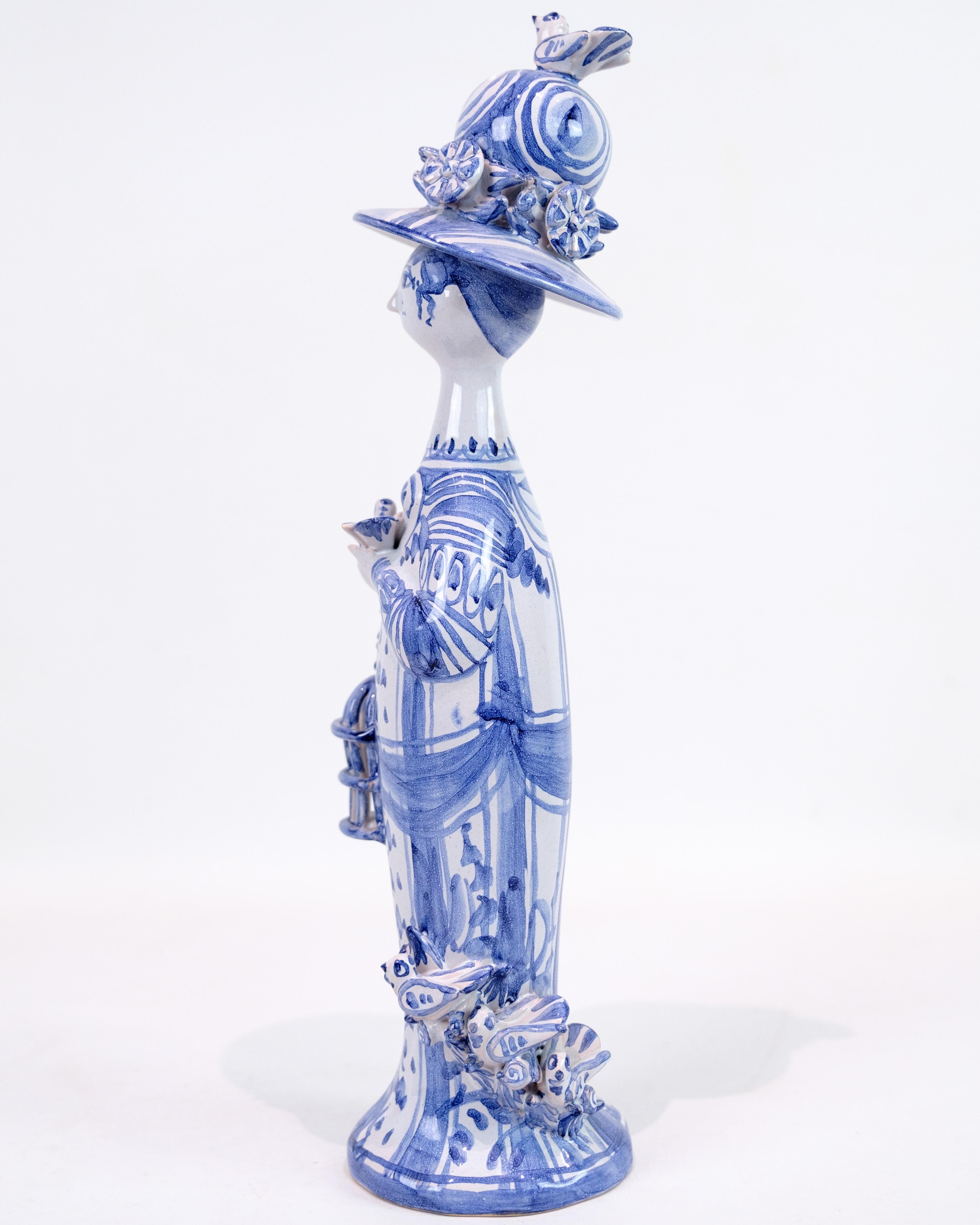 Intact Bjørn Wiinblad figure made in ceramic model spring of blue and white colors. Produced in connection with the 