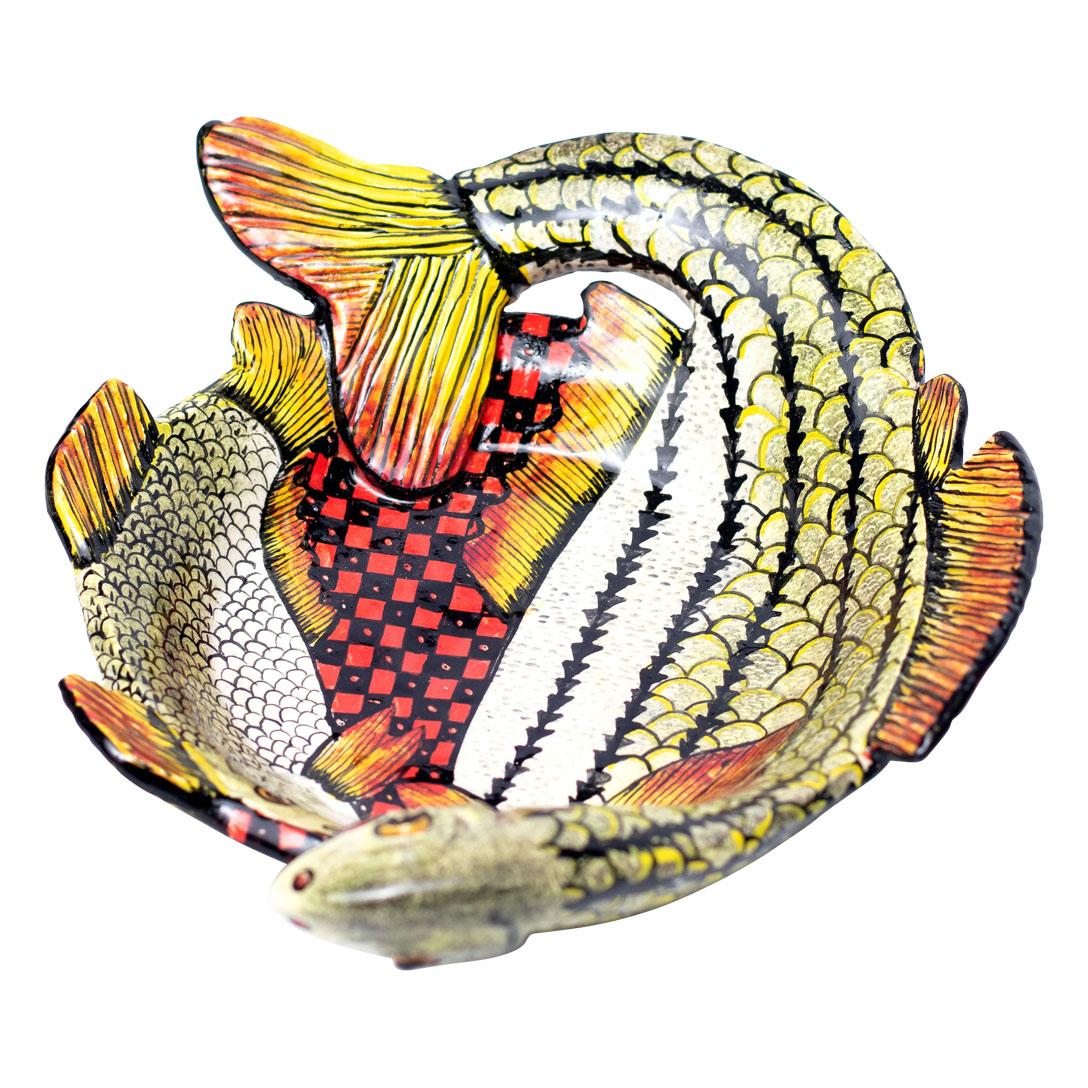 Fish Coin Dish
Hand Painted by Zinhle Nene and Sculpted by Sbusiso Ndaba
From Love Art Ceramic, South Africa (2024)

Dive into the charm of the Fish Coin Dish, a delightful piece of ceramic art that embodies the vibrant aquatic life of South Africa.