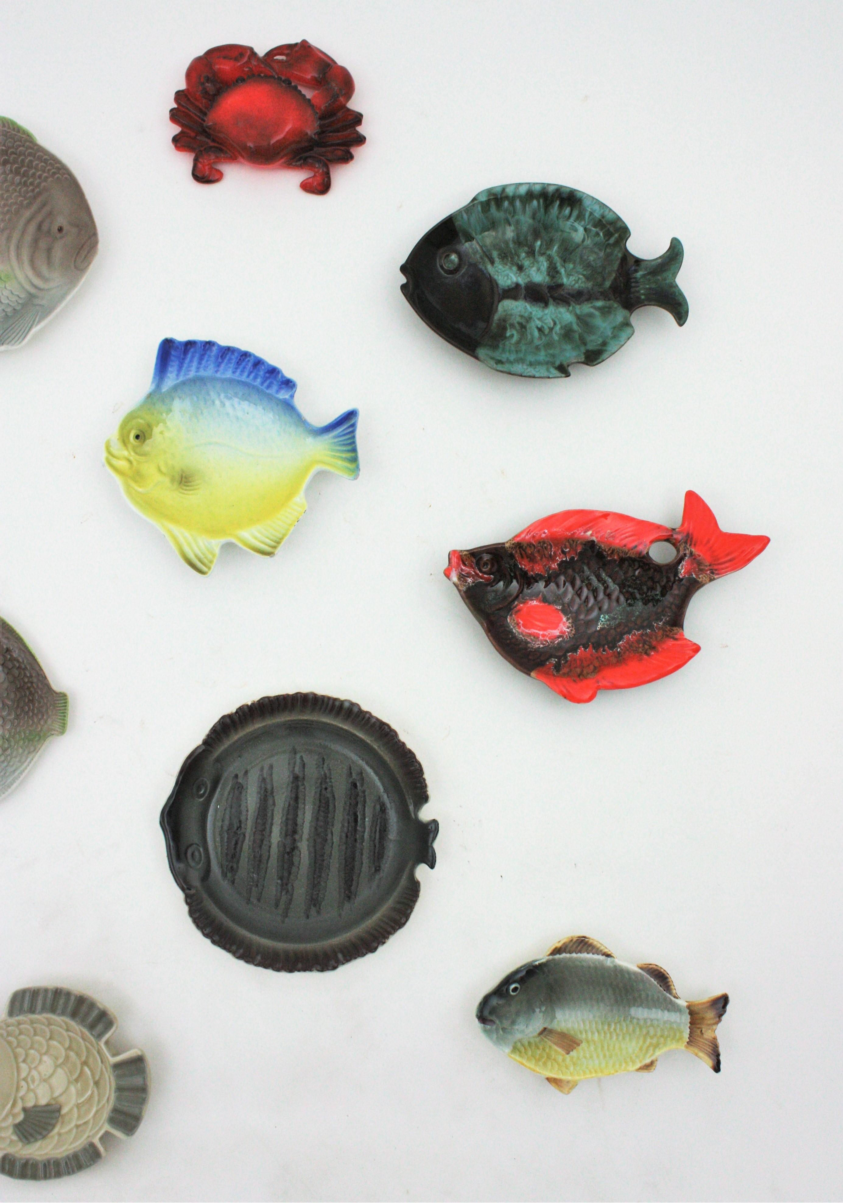 Glazed Wall Art Composition of Mid-Century Modern Ceramic Fish Shaped Plates For Sale