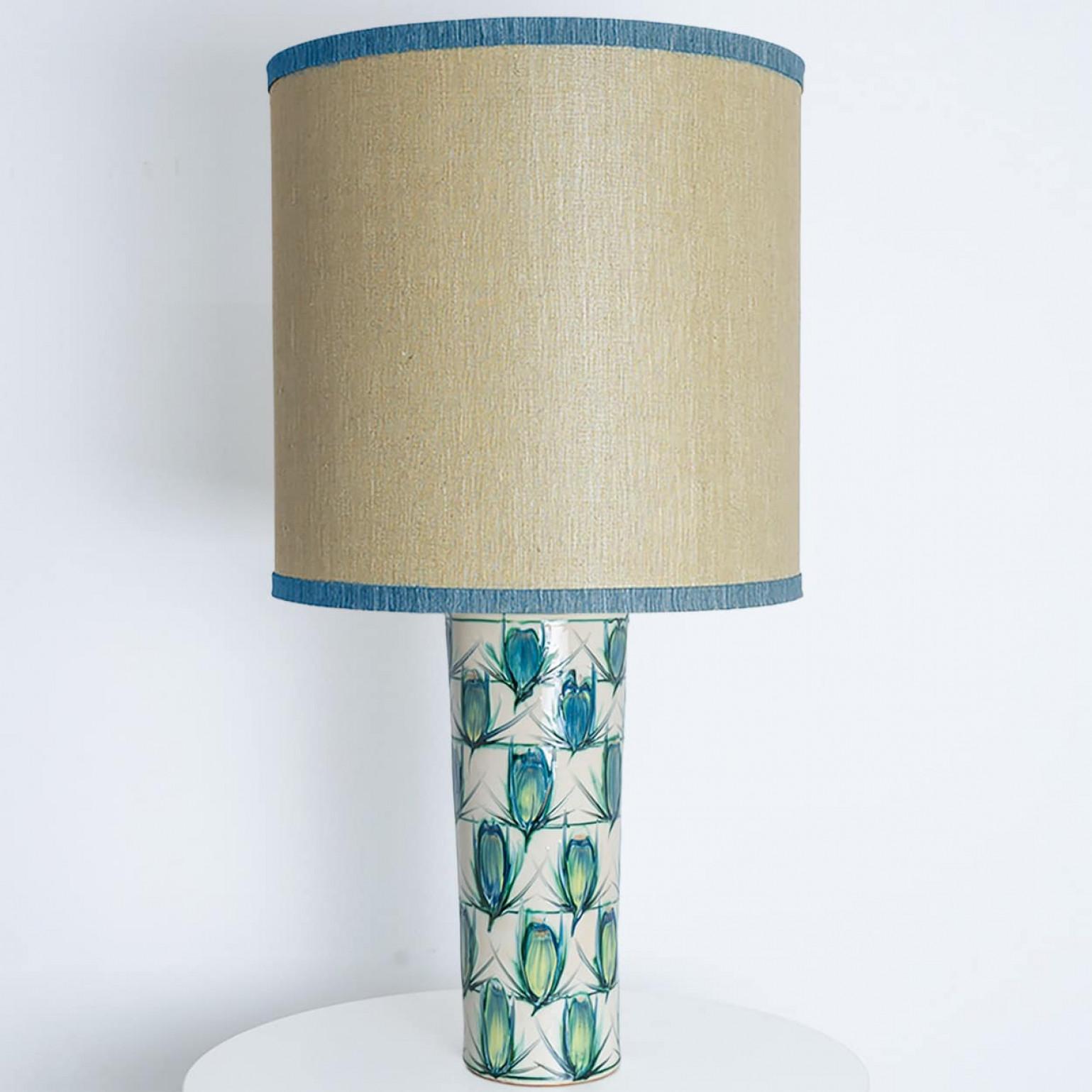Beautiful colorful table or floor Lamp , 1970s.

This lamp base brings refined elegance and rich visual appeal to any interior. With its beautiful decorative print, it offers a unique presence. 

This ceramic base with blue tones fits perfectly with