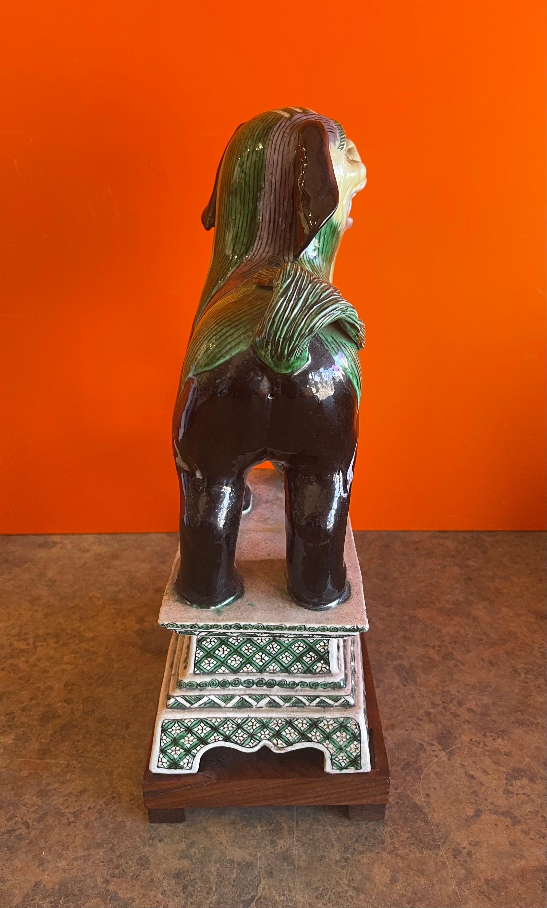20th Century Ceramic Foo Dog Sculpture on Mahogany Base For Sale