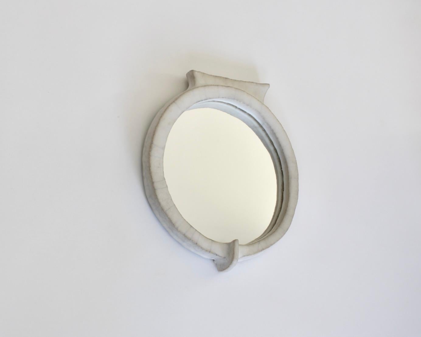 Mid-Century Modern Ceramic Framed Wall Mirror in the Sculptural Form Of A Cat c1960 For Sale