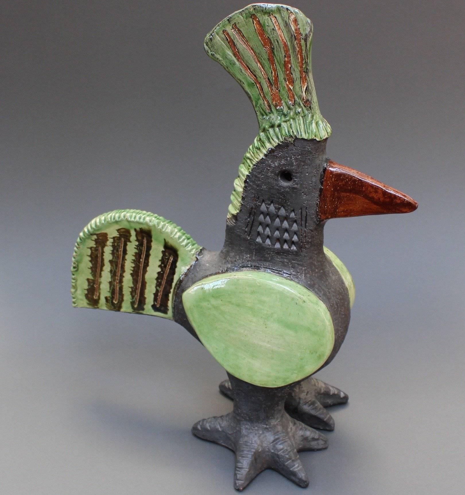 Ceramic French Rooster(s) by Dominique Pouchain, circa 1990s. This whimsical coq is pure joy to look at and to display. The artist himself indicated he had so much fun in its creation. The body is flat black with etched markings; the wings, tail,