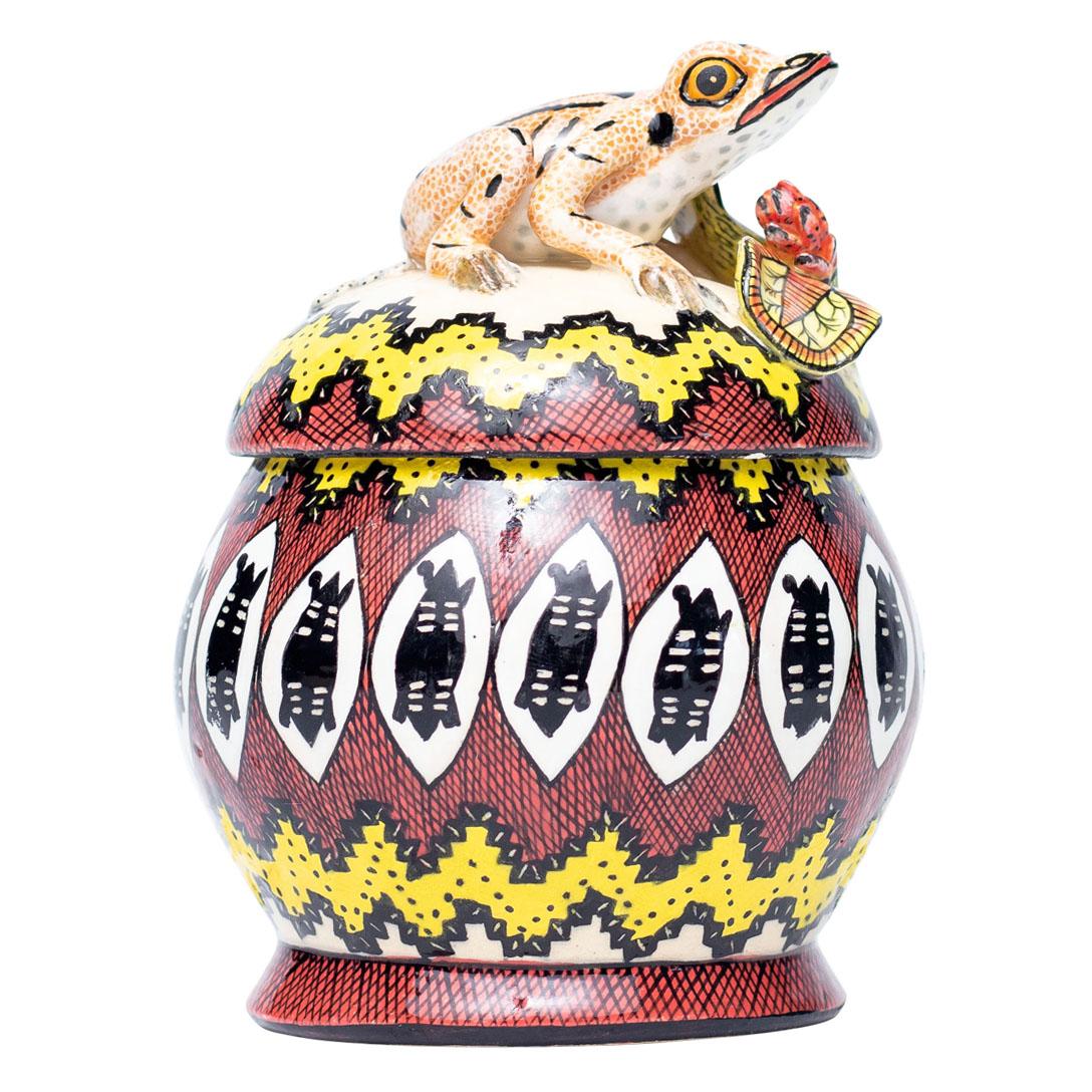 Frog Jewelry Box Hand Painted by Slie and Sculpted by Nathi/Sbusiso
Delight in the whimsical charm of the Frog Jewelry Box, a captivating piece of decorative art crafted by Love Art Ceramic in South Africa. Sculpted by the talented Nathi or Sbusiso