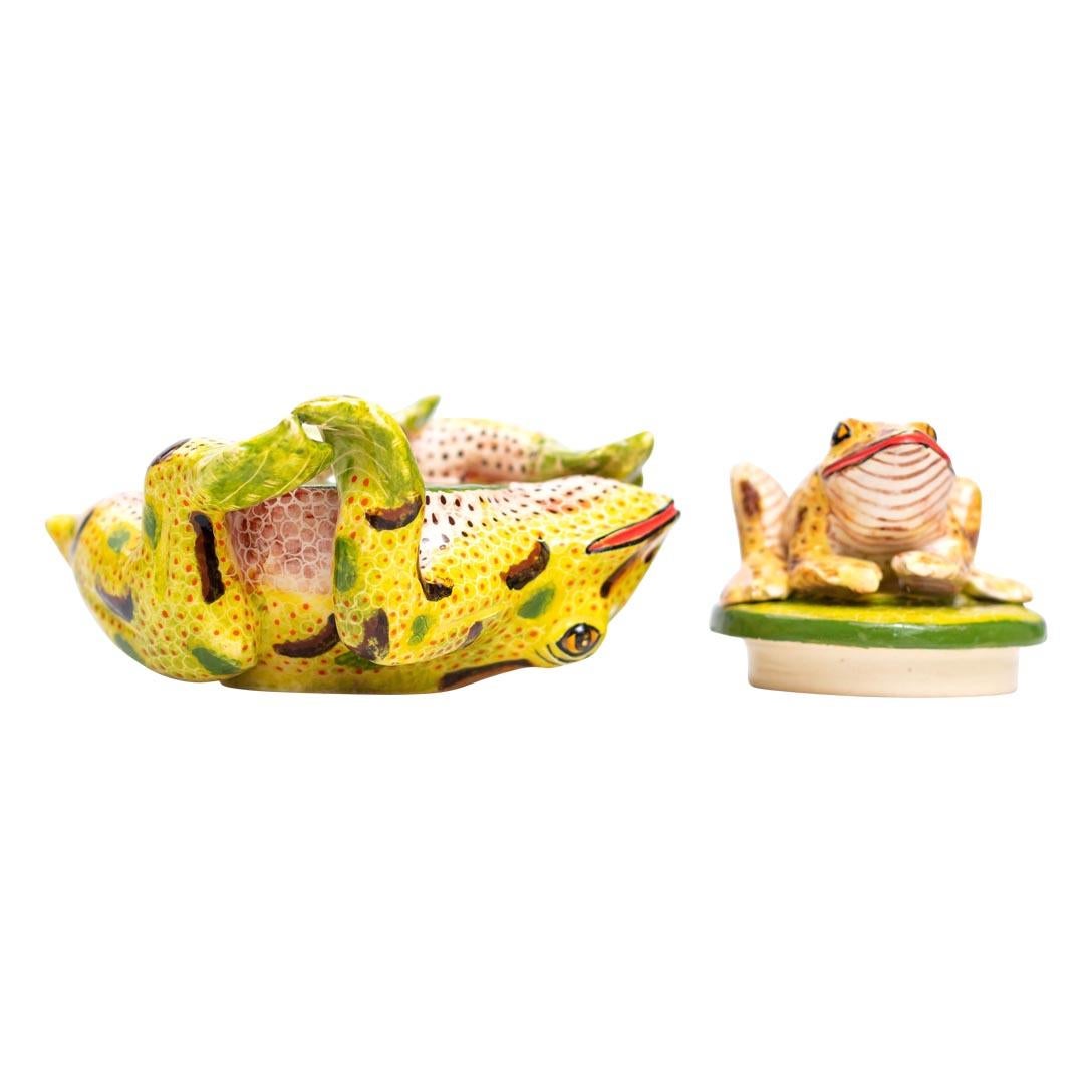 This delightful ceramic jewelry box by Love Art Ceramics is a charming fusion of African artistry and nature-inspired design. Measuring 2 inches in height, 3 inches in width, and 4 inches in length, the piece is compact yet brimming with character.